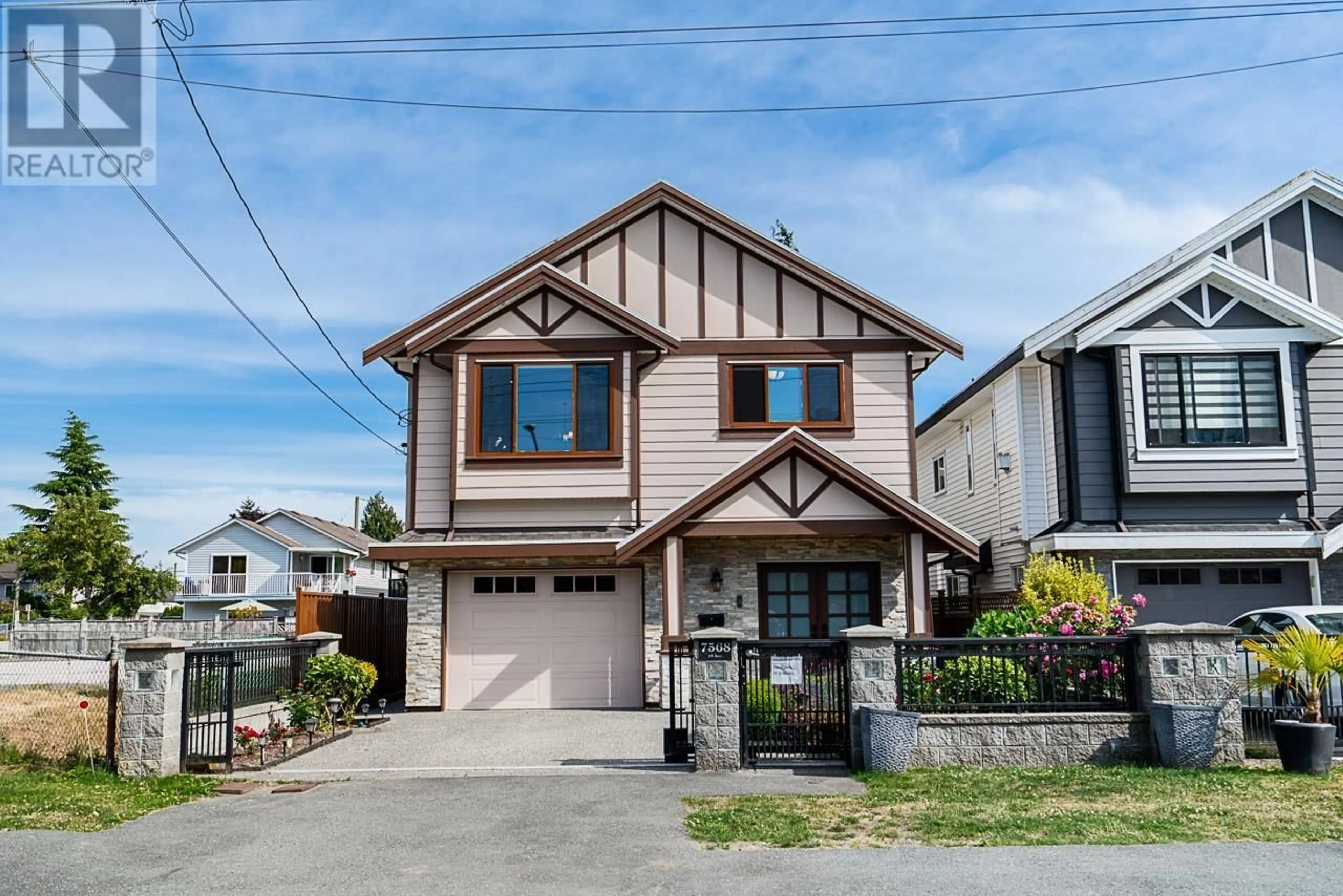 Home with vinyl exterior material, street for 7568 19TH AVENUE, Burnaby British Columbia V3N1E6