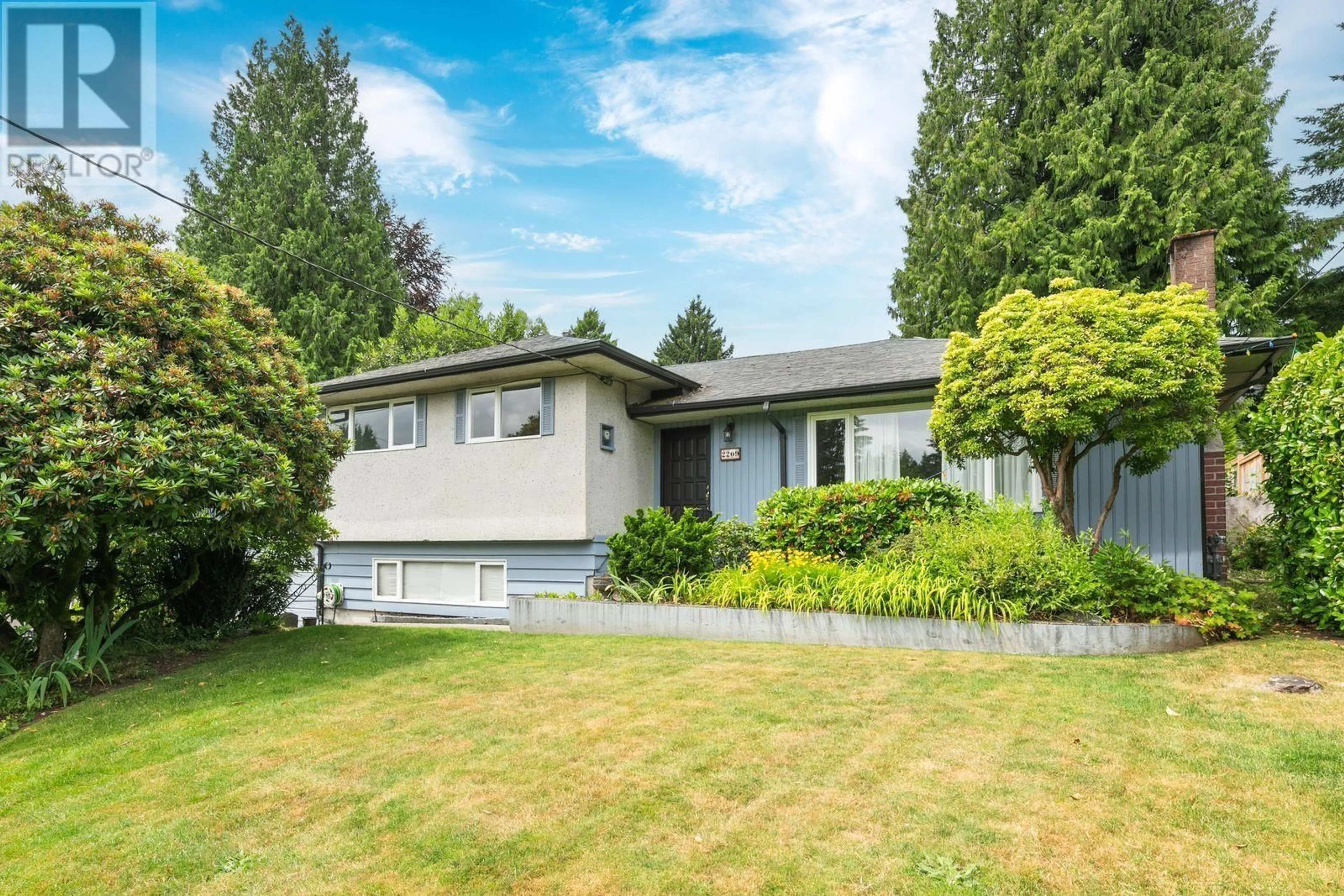 Home with vinyl exterior material, street for 2209 GREYLYNN CRESCENT, North Vancouver British Columbia V7J2X6
