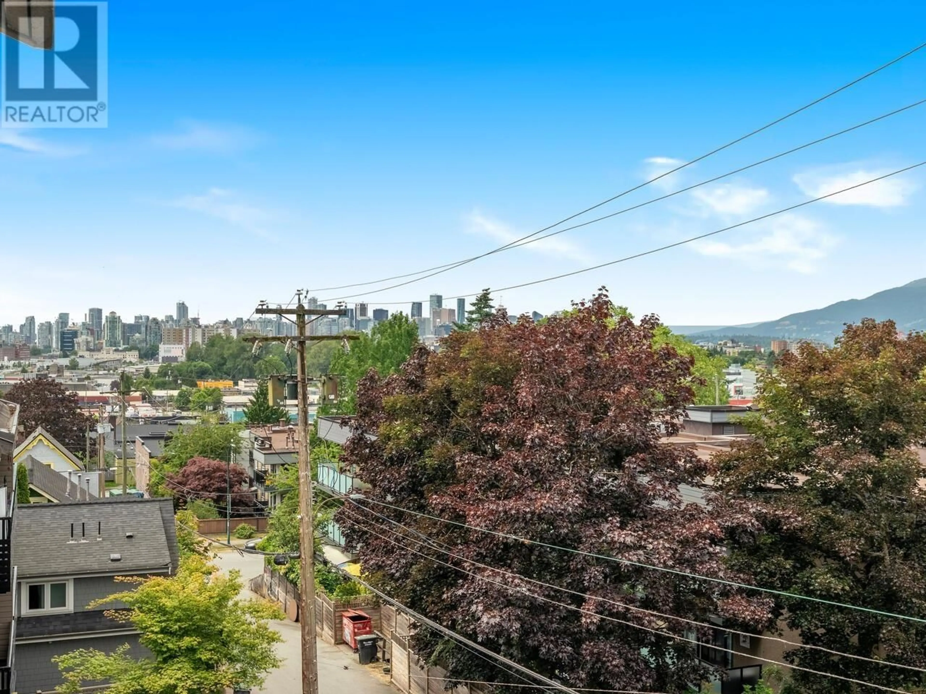 A pic from outside/outdoor area/front of a property/back of a property/a pic from drone, mountain view for 408 - 1549 KITCHENER STREET, Vancouver British Columbia V5L2V8
