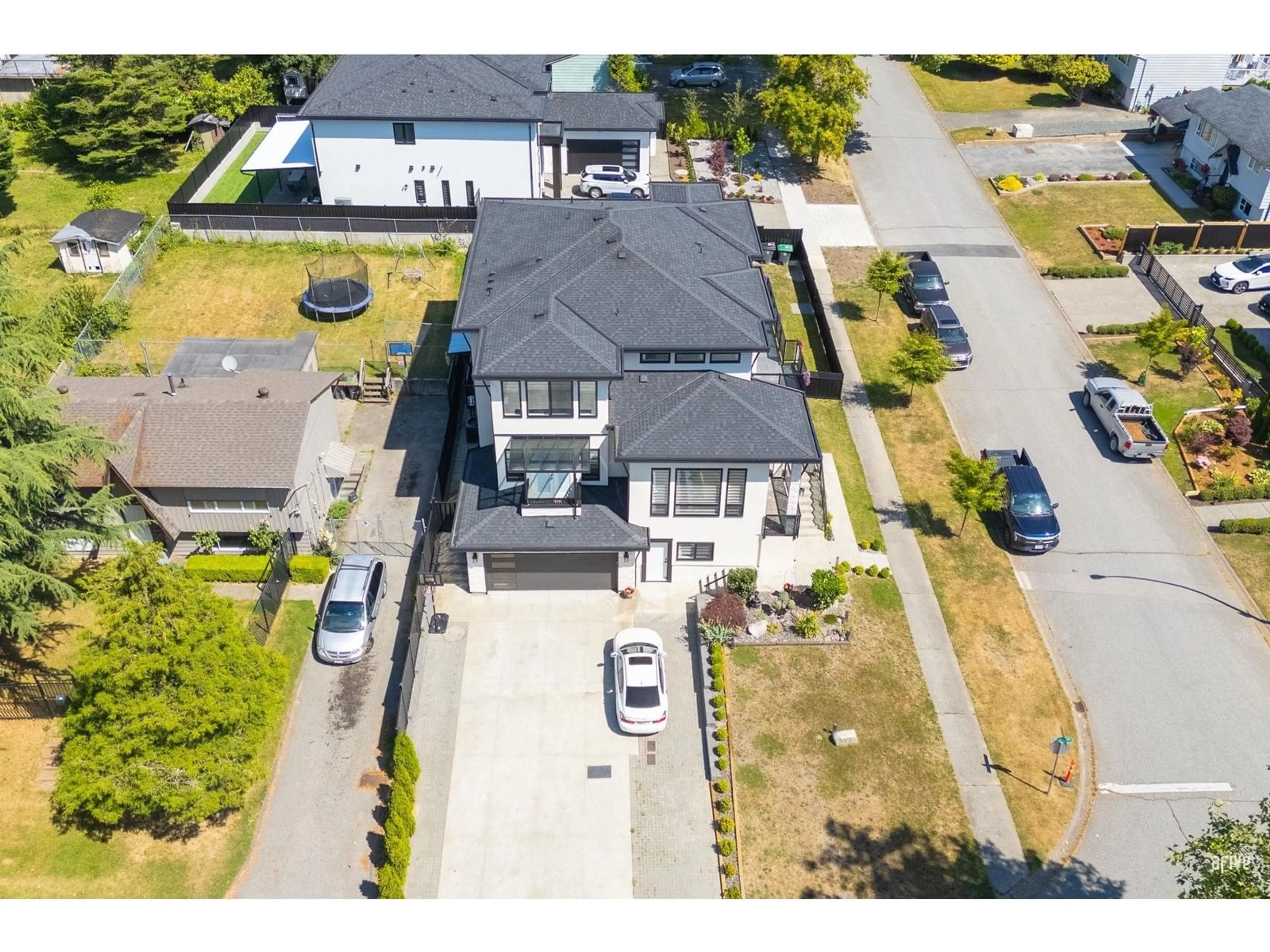 A pic from outside/outdoor area/front of a property/back of a property/a pic from drone, street for 8619 AUGUST, Surrey British Columbia V3S5A4