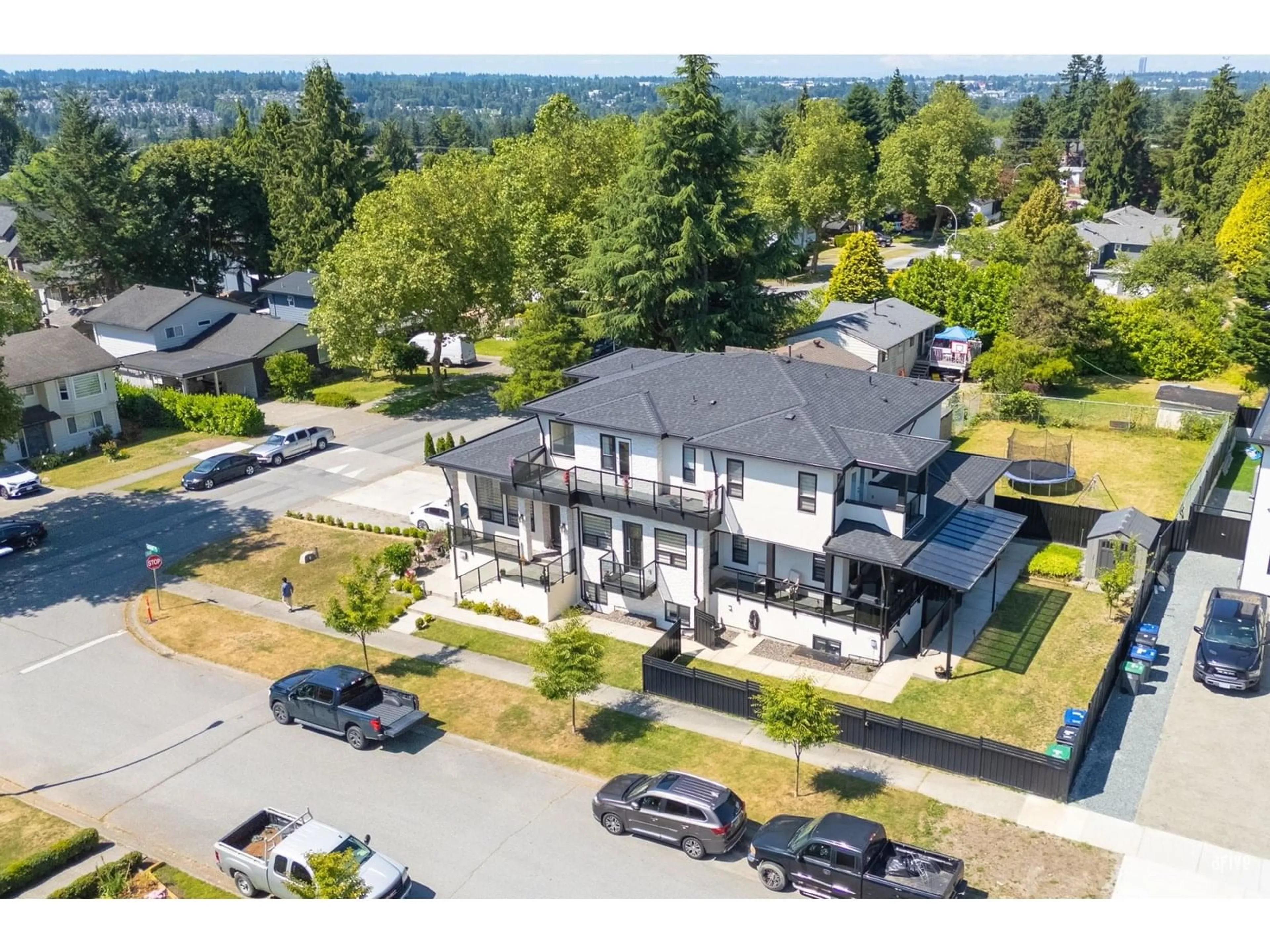 A pic from outside/outdoor area/front of a property/back of a property/a pic from drone, street for 8619 AUGUST, Surrey British Columbia V3S5A4