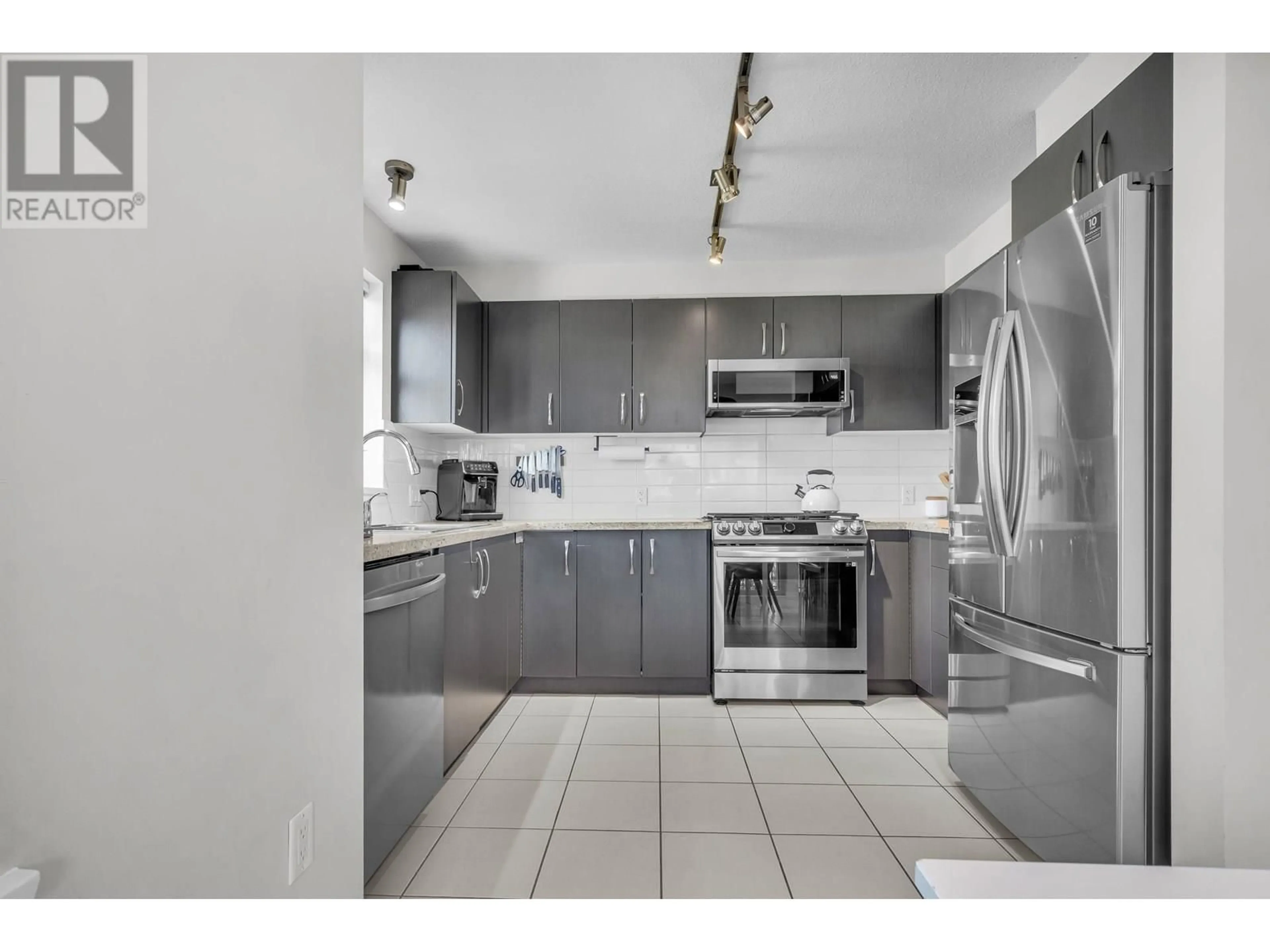 Standard kitchen, ceramic/tile floor for 329 - 9288 ODLIN ROAD, Richmond British Columbia V6X0C3