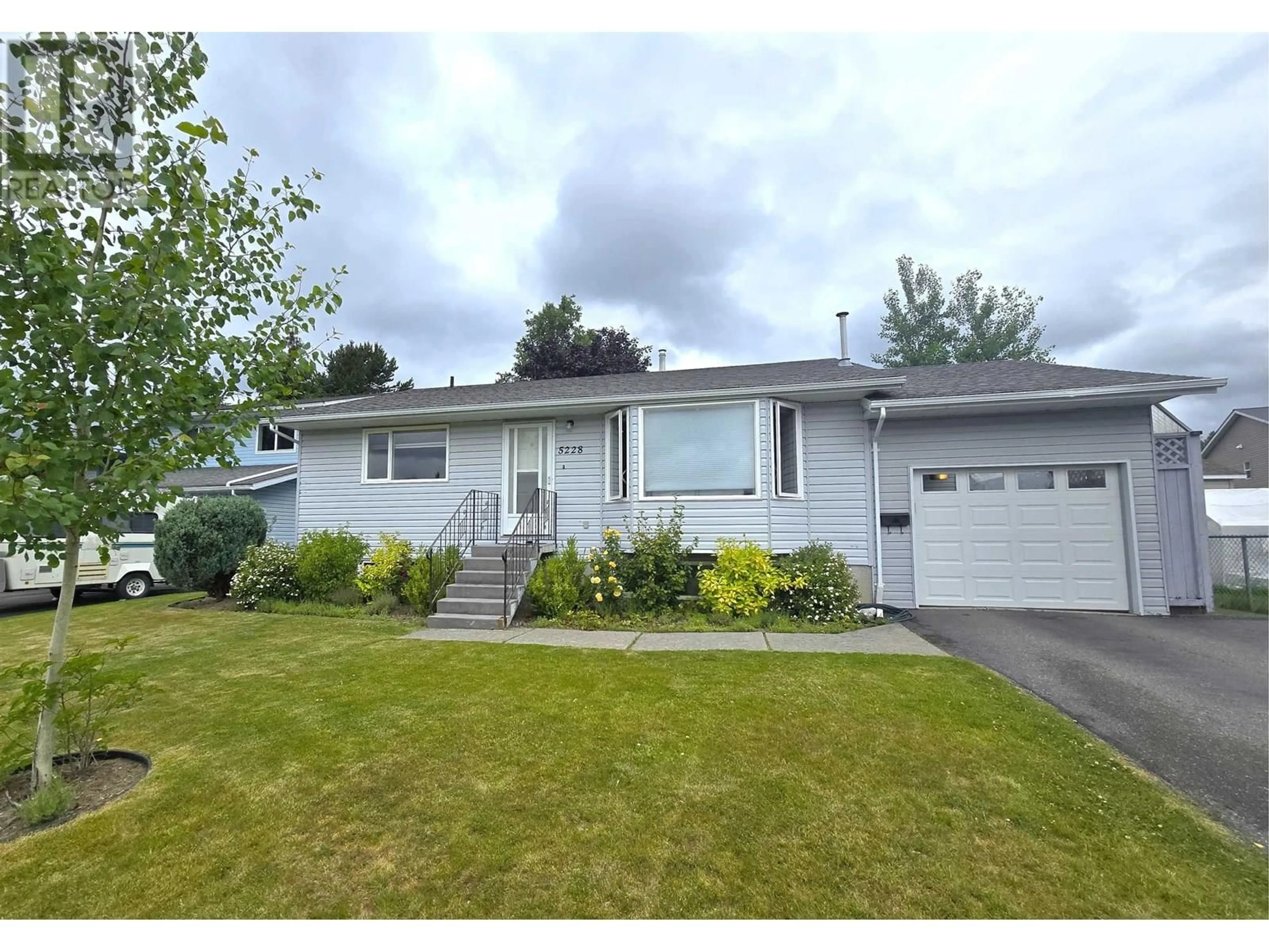 Home with vinyl exterior material, street for 5228 MOUNTAIN VISTA DRIVE, Terrace British Columbia V8G4X5