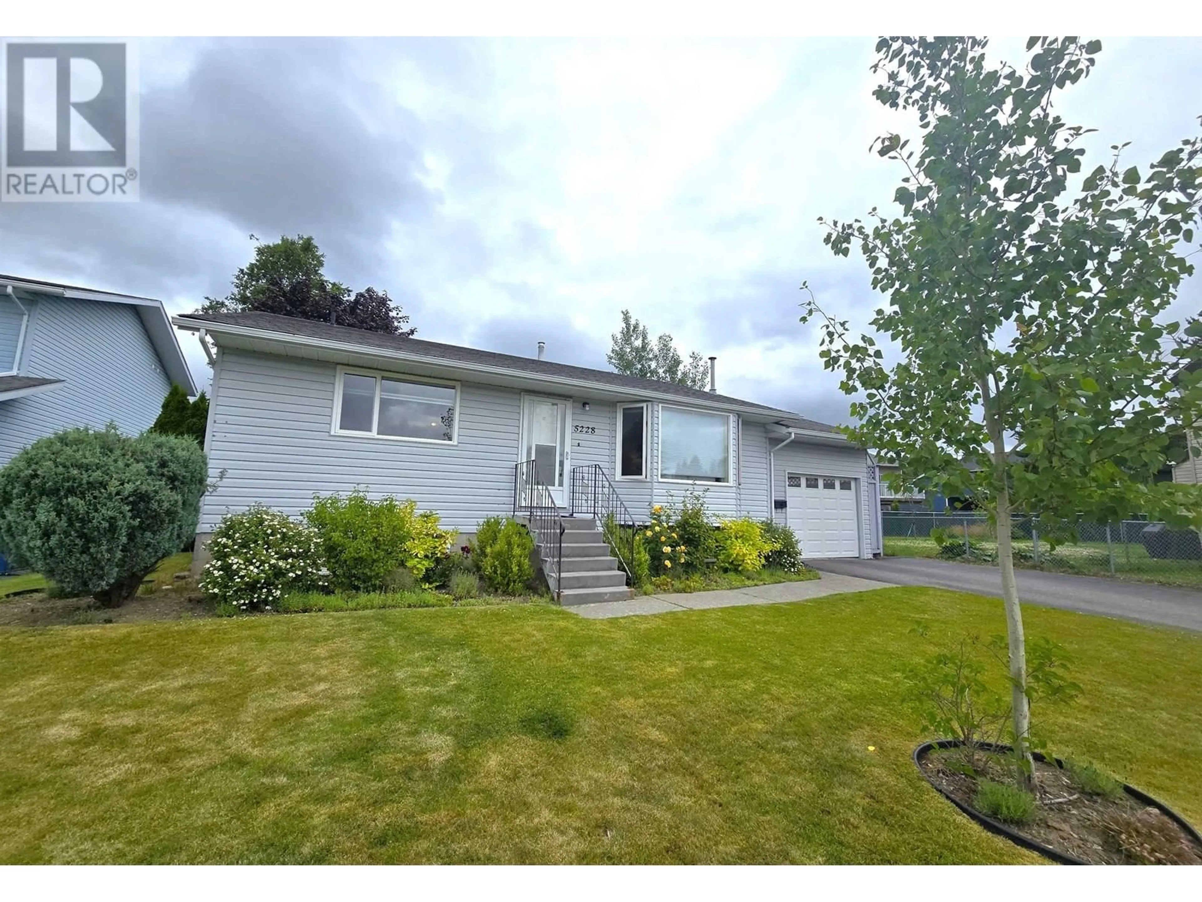 Home with vinyl exterior material, street for 5228 MOUNTAIN VISTA DRIVE, Terrace British Columbia V8G4X5