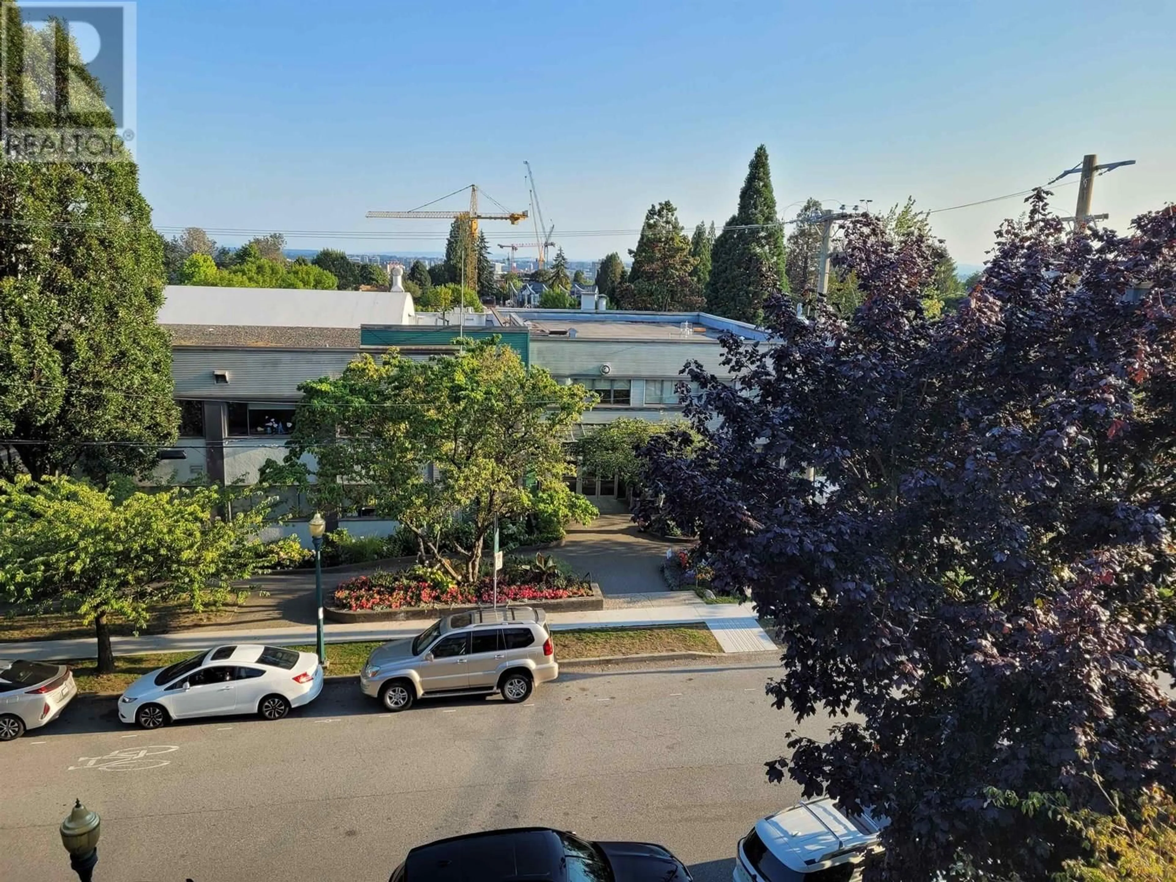 A pic from outside/outdoor area/front of a property/back of a property/a pic from drone, city buildings view from balcony for 401 - 995 59TH AVENUE, Vancouver British Columbia V6P6Z2