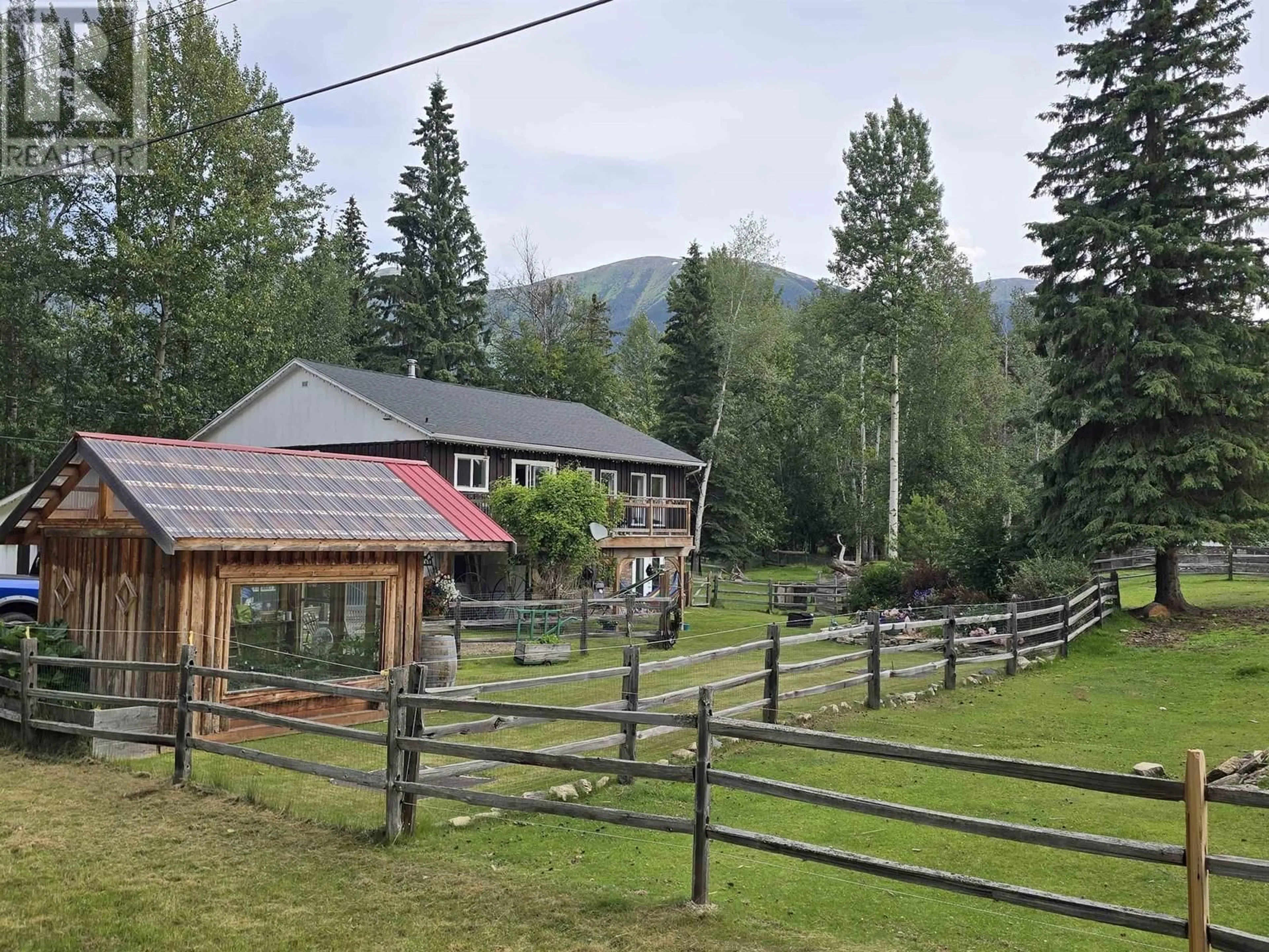 A pic from outside/outdoor area/front of a property/back of a property/a pic from drone, mountain view for 1350 DYKE ROAD, McBride British Columbia V0J2E0