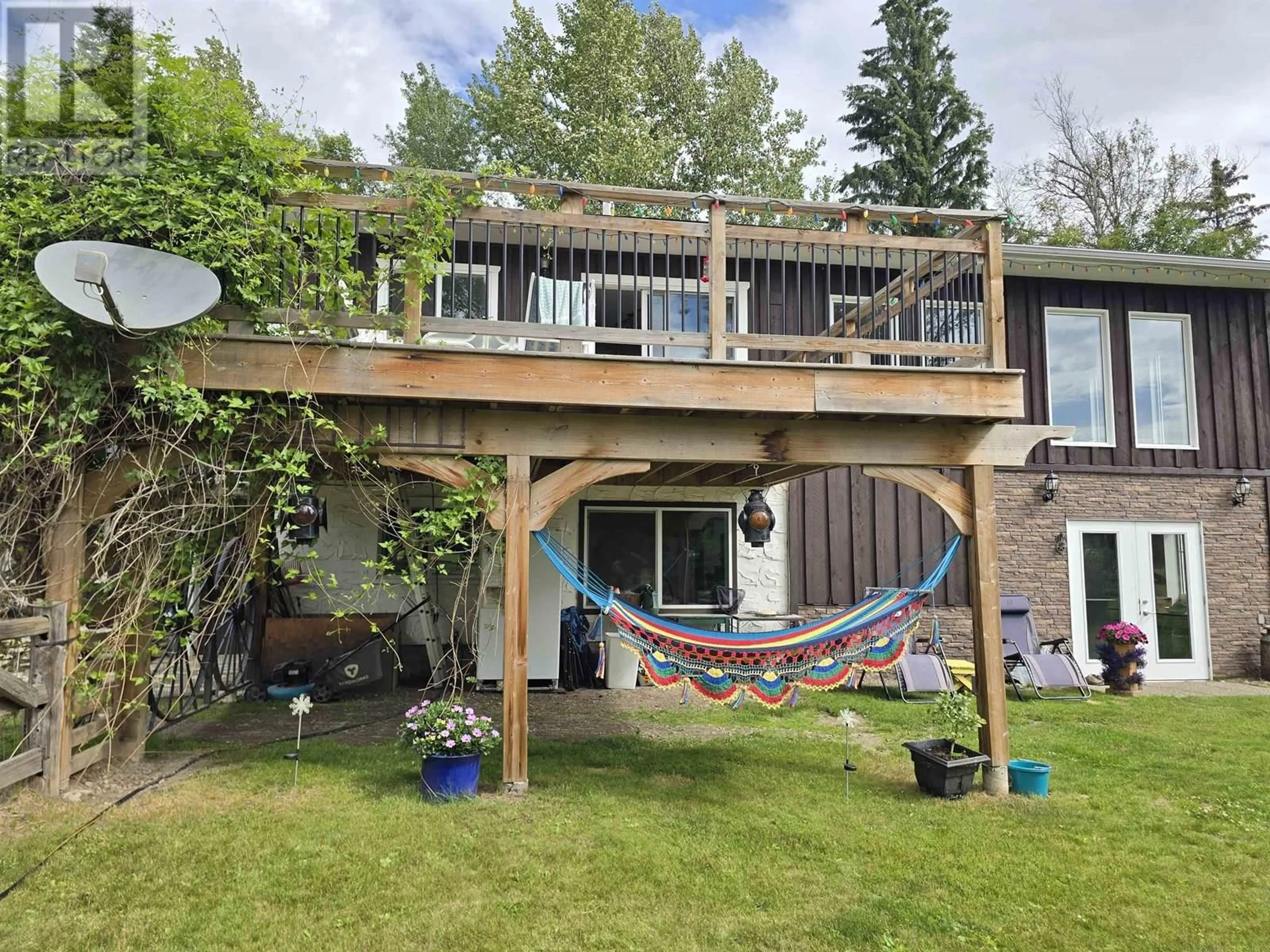 A pic from outside/outdoor area/front of a property/back of a property/a pic from drone, mountain view for 1350 DYKE ROAD, McBride British Columbia V0J2E0