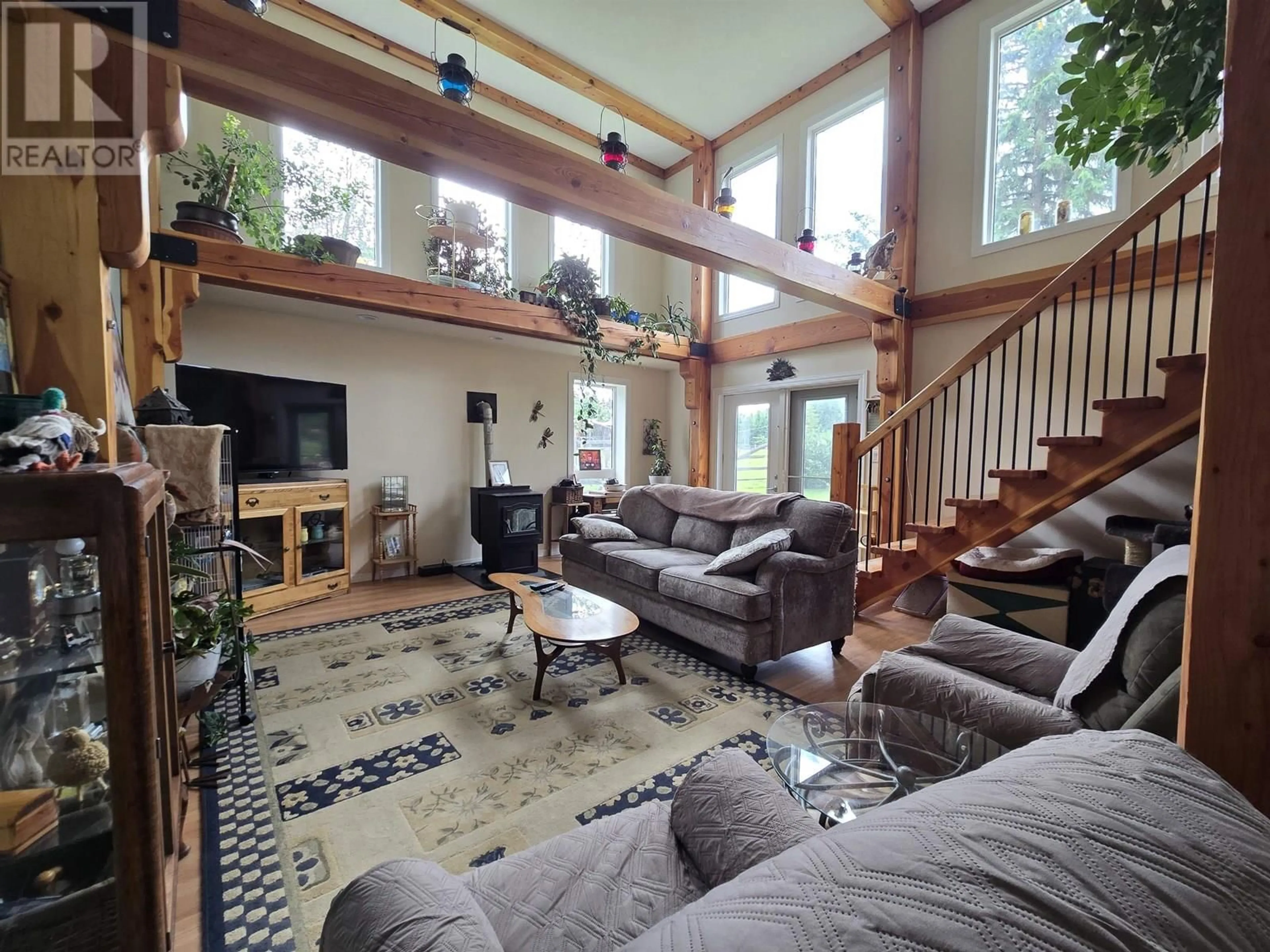 Living room with furniture, wood/laminate floor for 1350 DYKE ROAD, McBride British Columbia V0J2E0