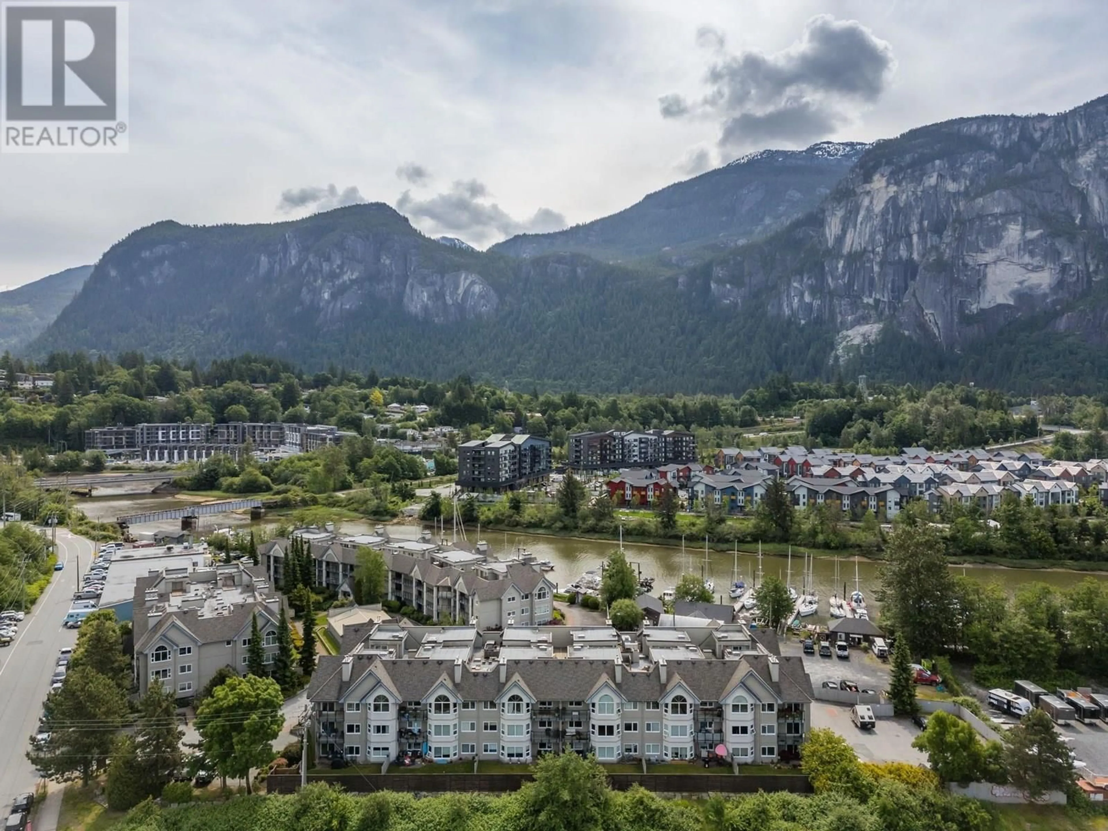 A pic from outside/outdoor area/front of a property/back of a property/a pic from drone, mountain view for 312 - 1466 PEMBERTON AVENUE, Squamish British Columbia V8B0K1