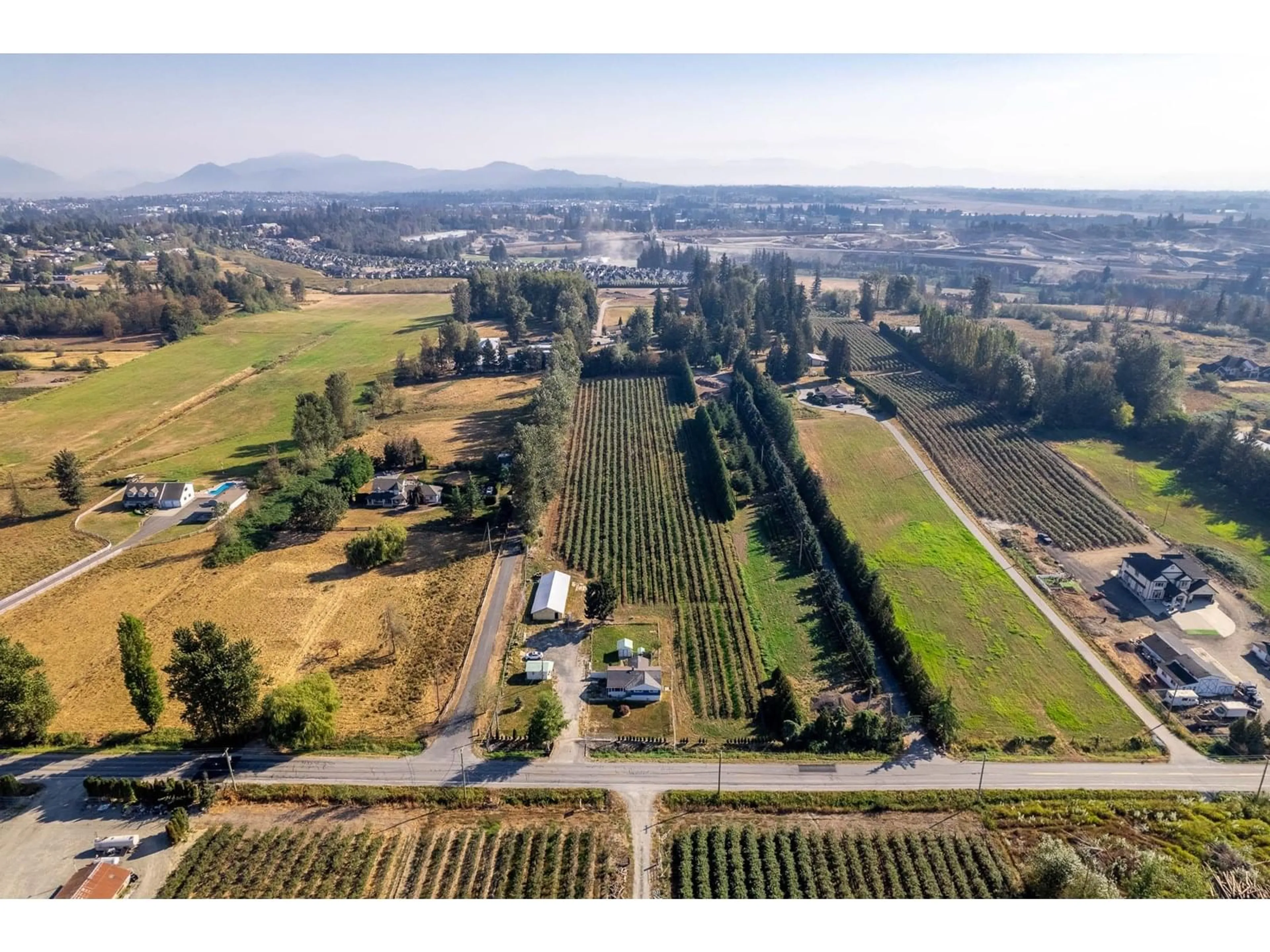 A pic from outside/outdoor area/front of a property/back of a property/a pic from drone, mountain view for 2034 BRADNER, Abbotsford British Columbia V4X1E5
