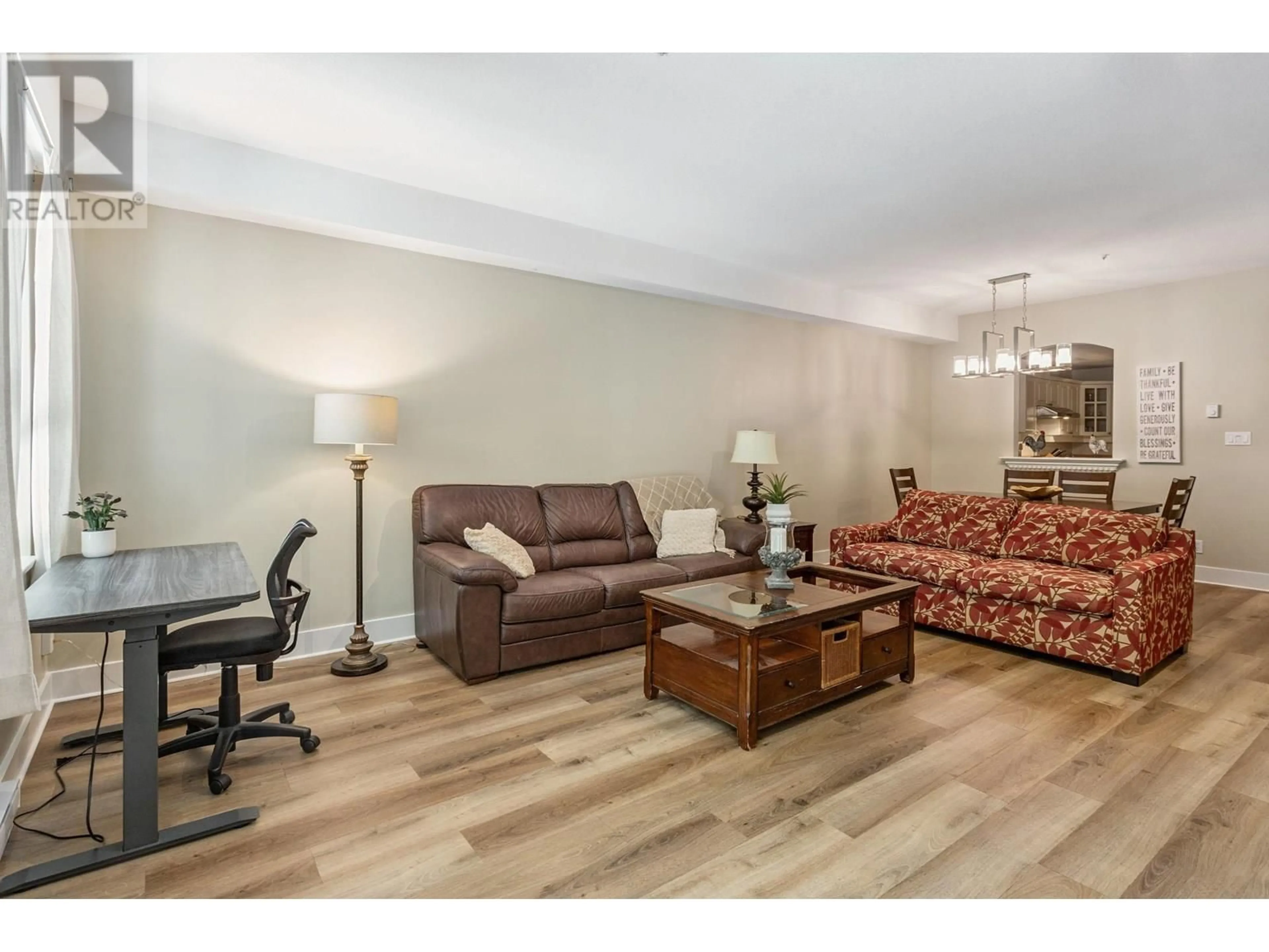 Living room with furniture, wood/laminate floor for 130 - 5835 HAMPTON PLACE, Vancouver British Columbia V6T2G2