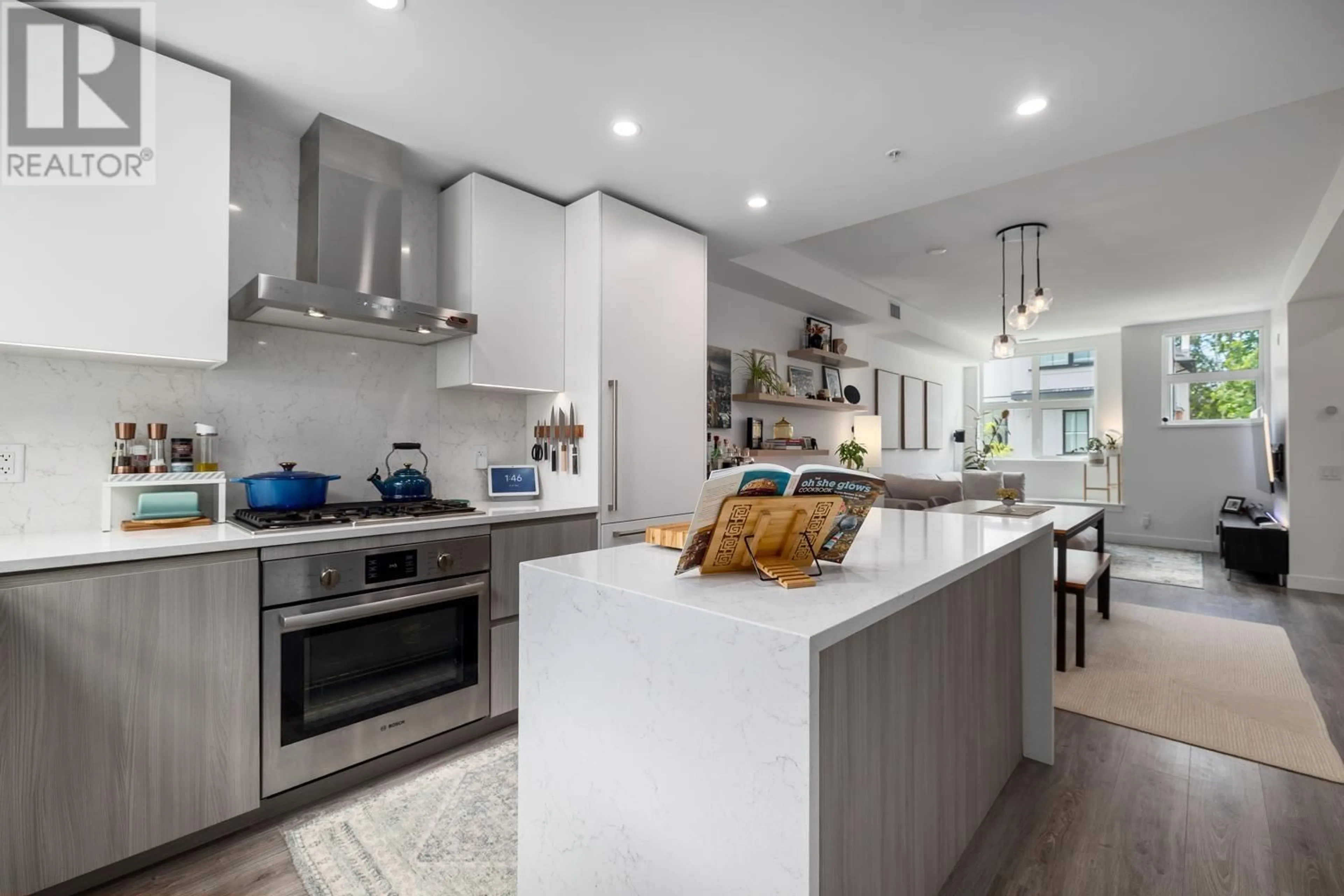 Open concept kitchen, ceramic/tile floor for 238 - 2060 CURLING ROAD, North Vancouver British Columbia V7P0E1