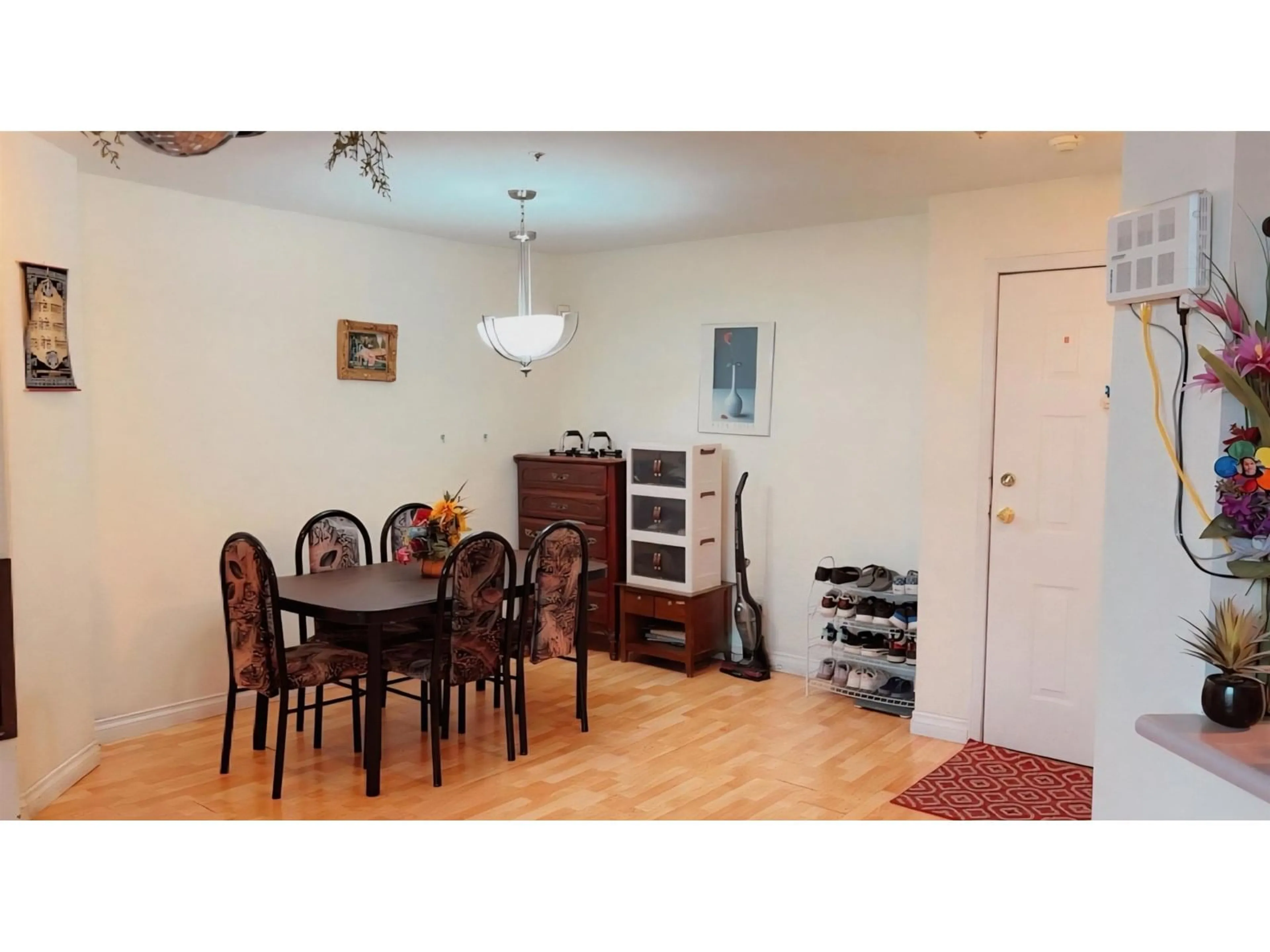 Dining room, wood/laminate floor for 309 - 7171 121, Surrey British Columbia V3W1G9