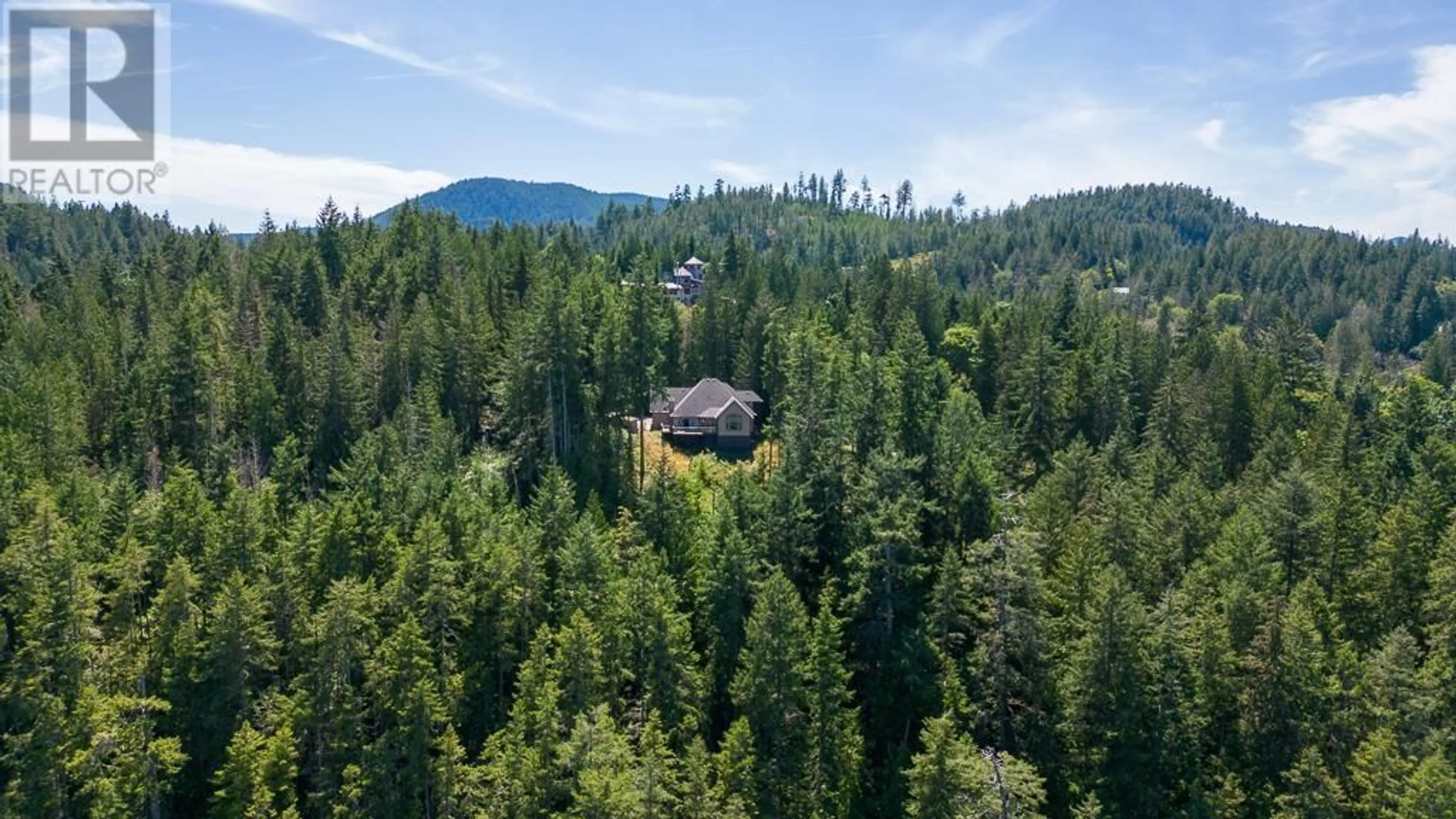 A pic from outside/outdoor area/front of a property/back of a property/a pic from drone, forest/trees view for 5500 JERVIS INLET ROAD, Egmont British Columbia V0N2H4