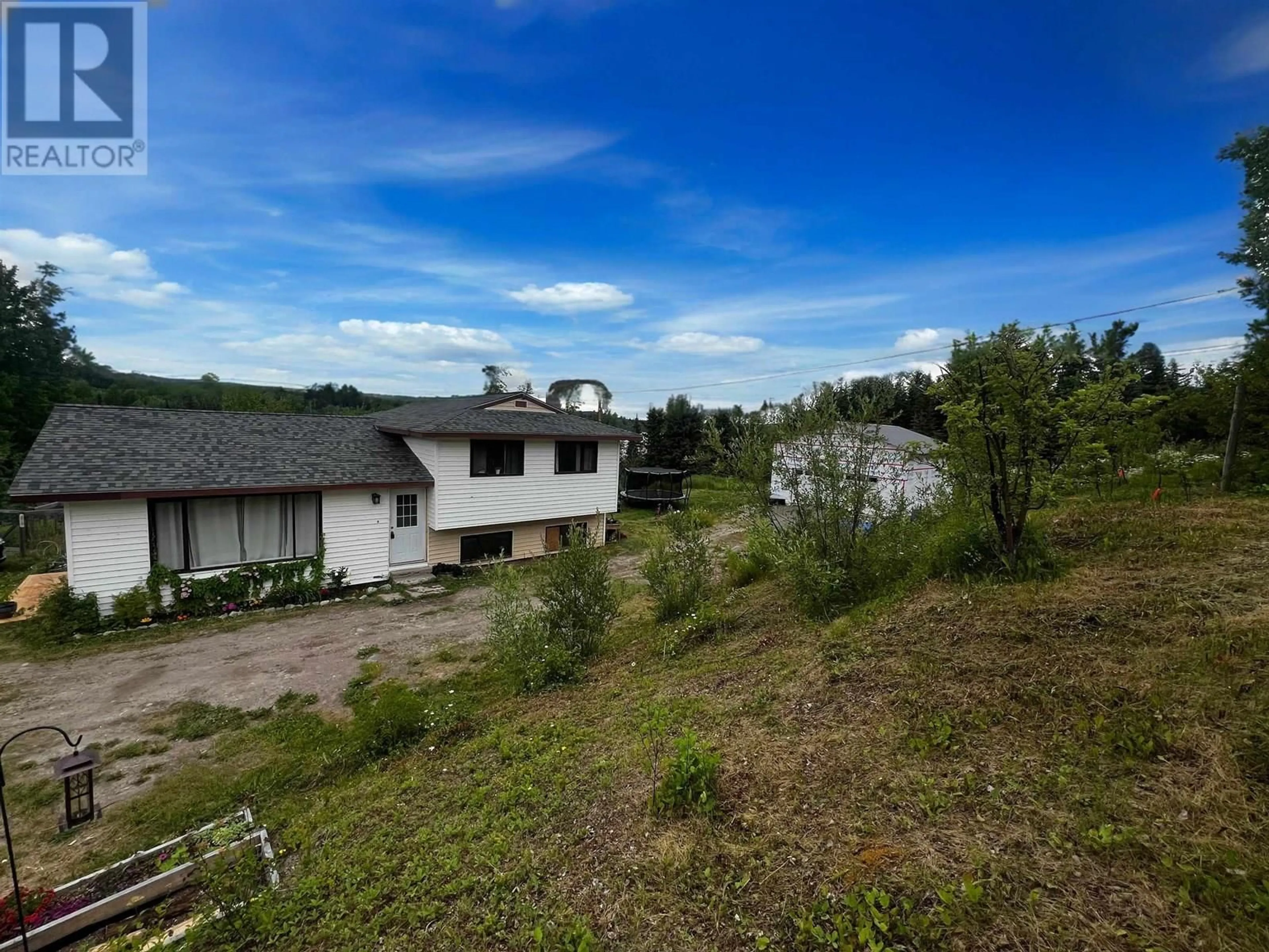 A pic from outside/outdoor area/front of a property/back of a property/a pic from drone, mountain view for 10897 BAYVIEW ROAD, Fraser Lake British Columbia V0J1S0