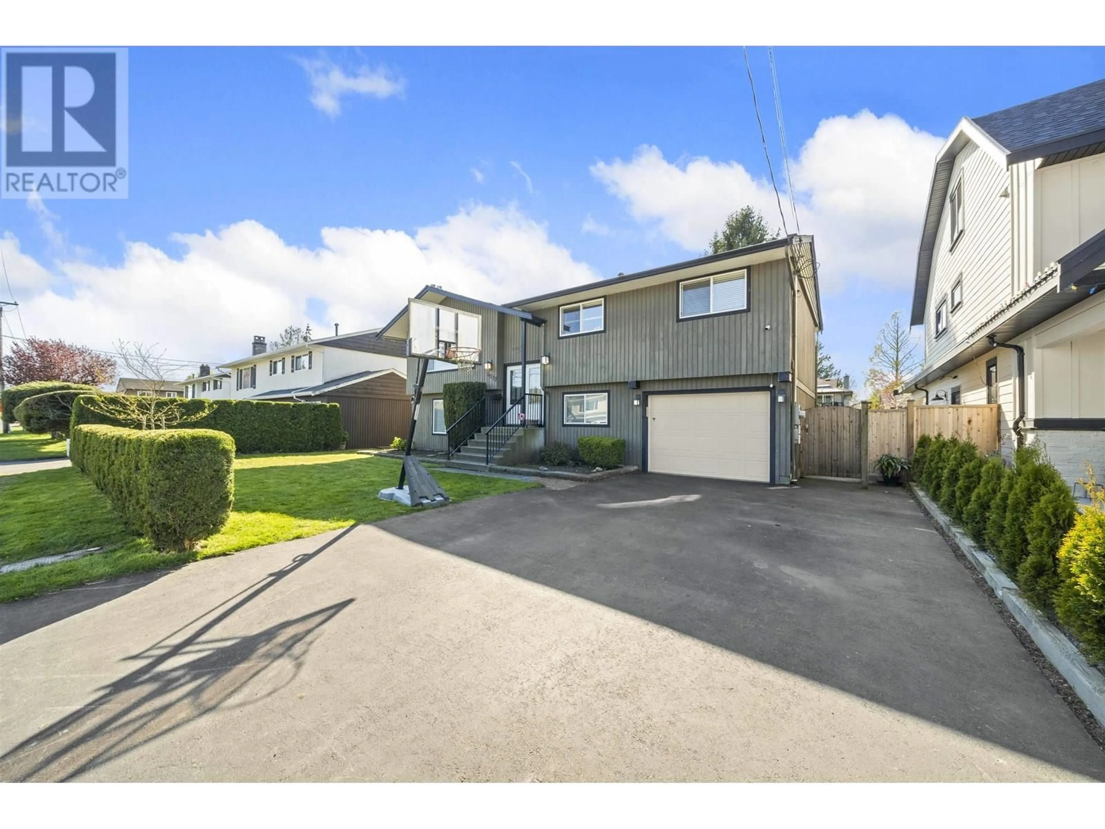 A pic from outside/outdoor area/front of a property/back of a property/a pic from drone, street for 4517 46A STREET, Ladner British Columbia V4K2M5