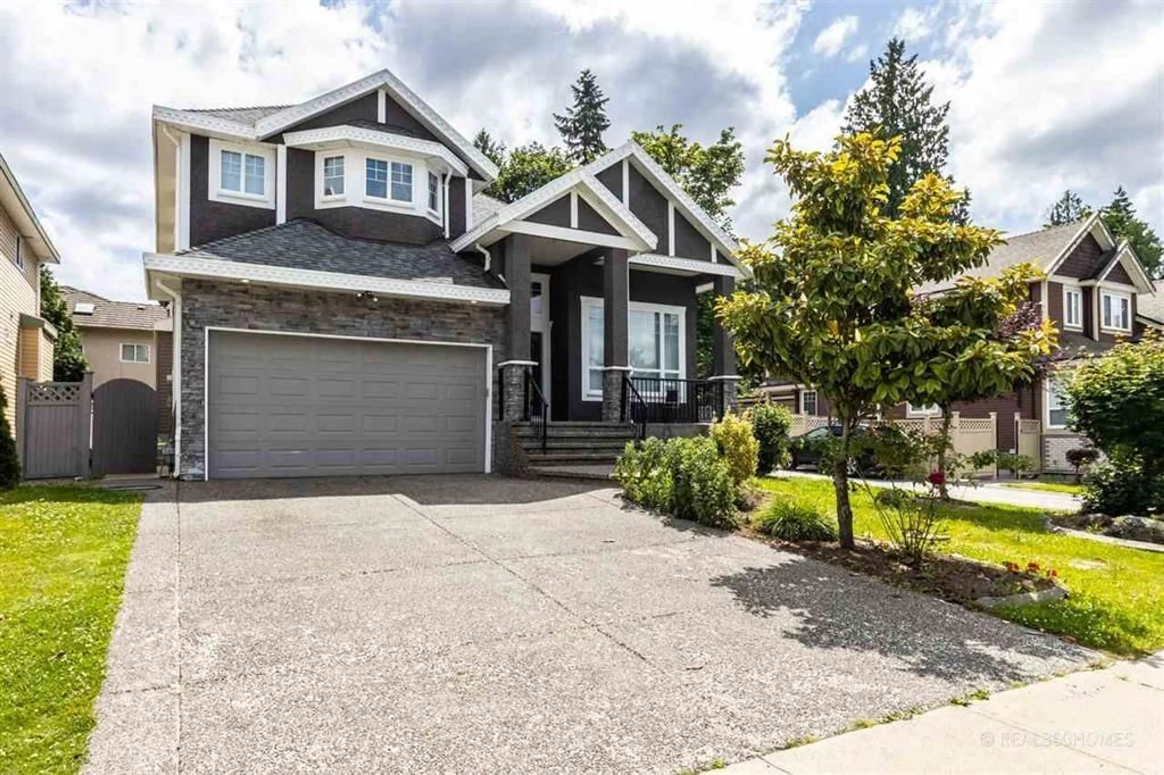 Home with vinyl exterior material, street for 12788 105A, Surrey British Columbia V3V0A6