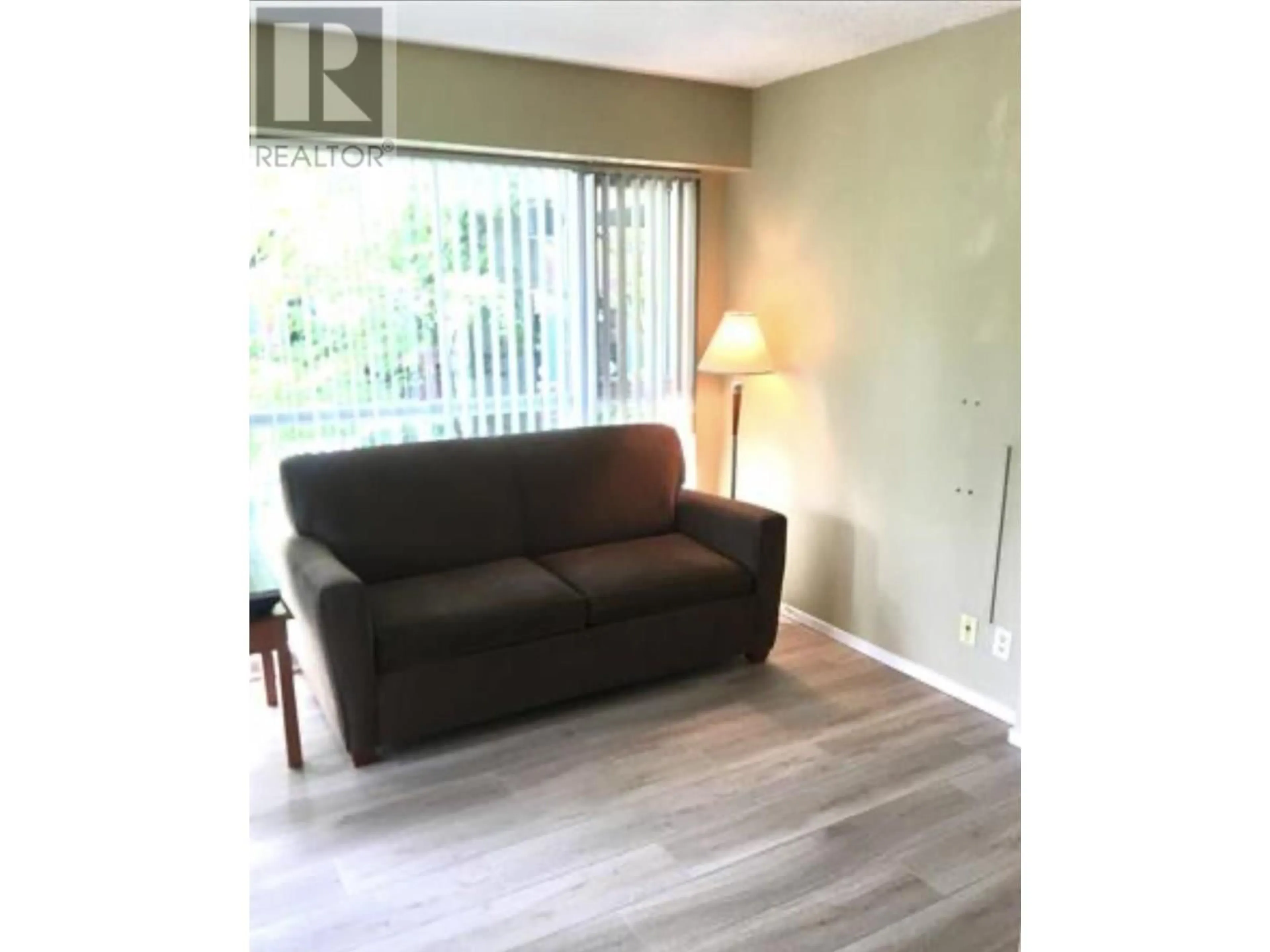 Living room with furniture, wood/laminate floor for 207 - 1889 ALBERNI STREET, Vancouver British Columbia V6G3G7