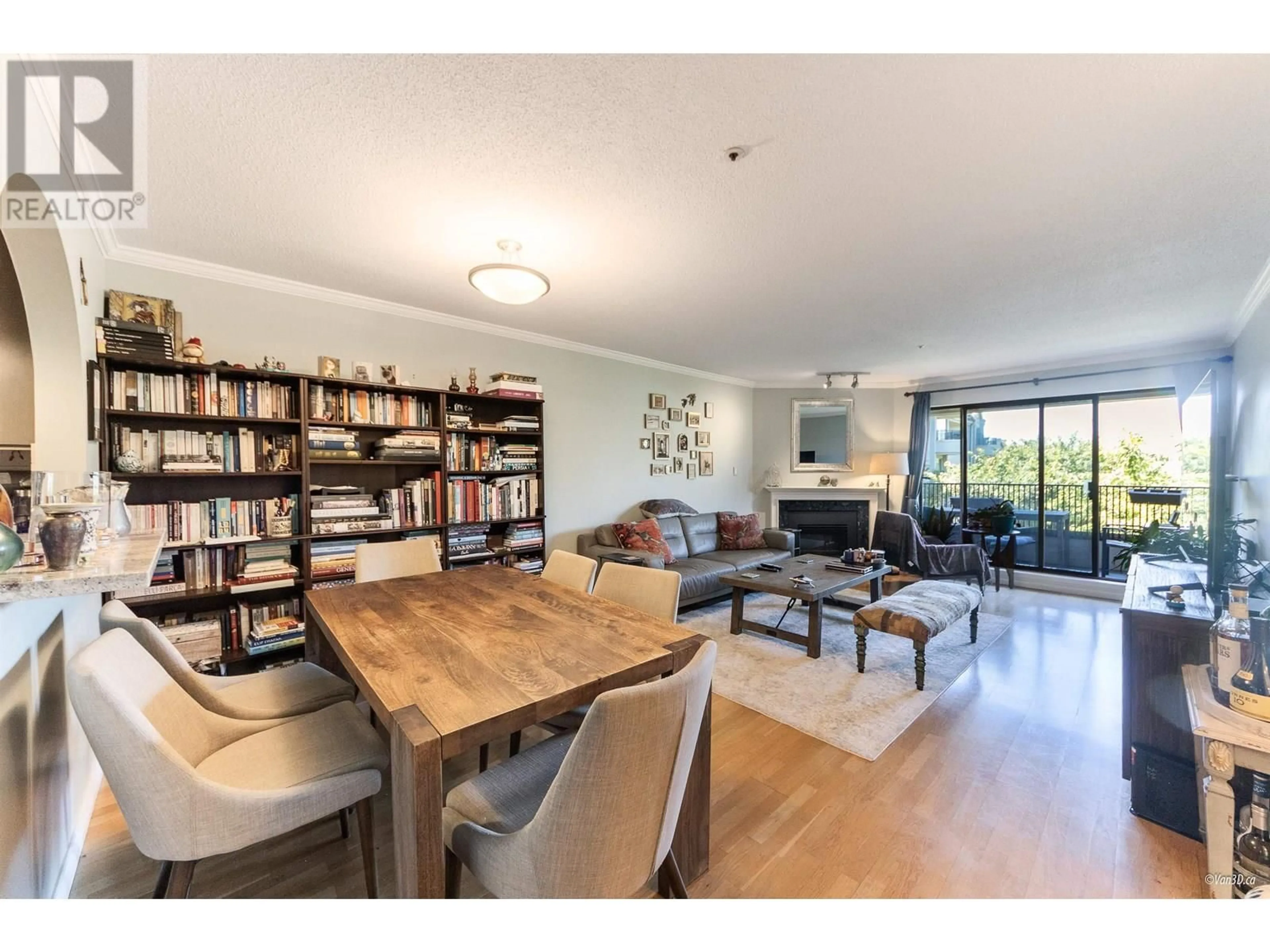 Living room with furniture, wood/laminate floor for 302 - 1869 SPYGLASS PLACE, Vancouver British Columbia V5Z4K7