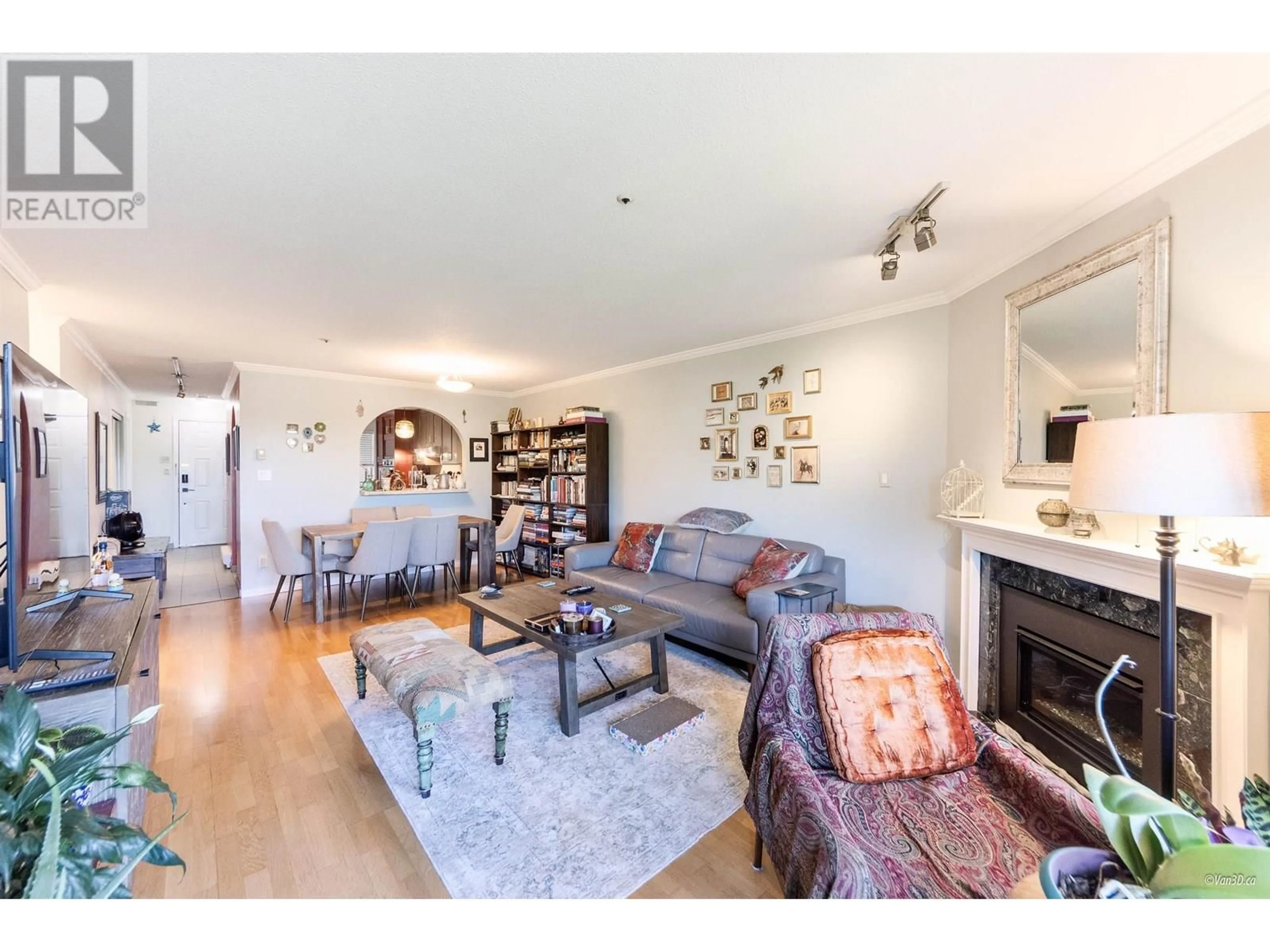 Living room with furniture, wood/laminate floor for 302 - 1869 SPYGLASS PLACE, Vancouver British Columbia V5Z4K7