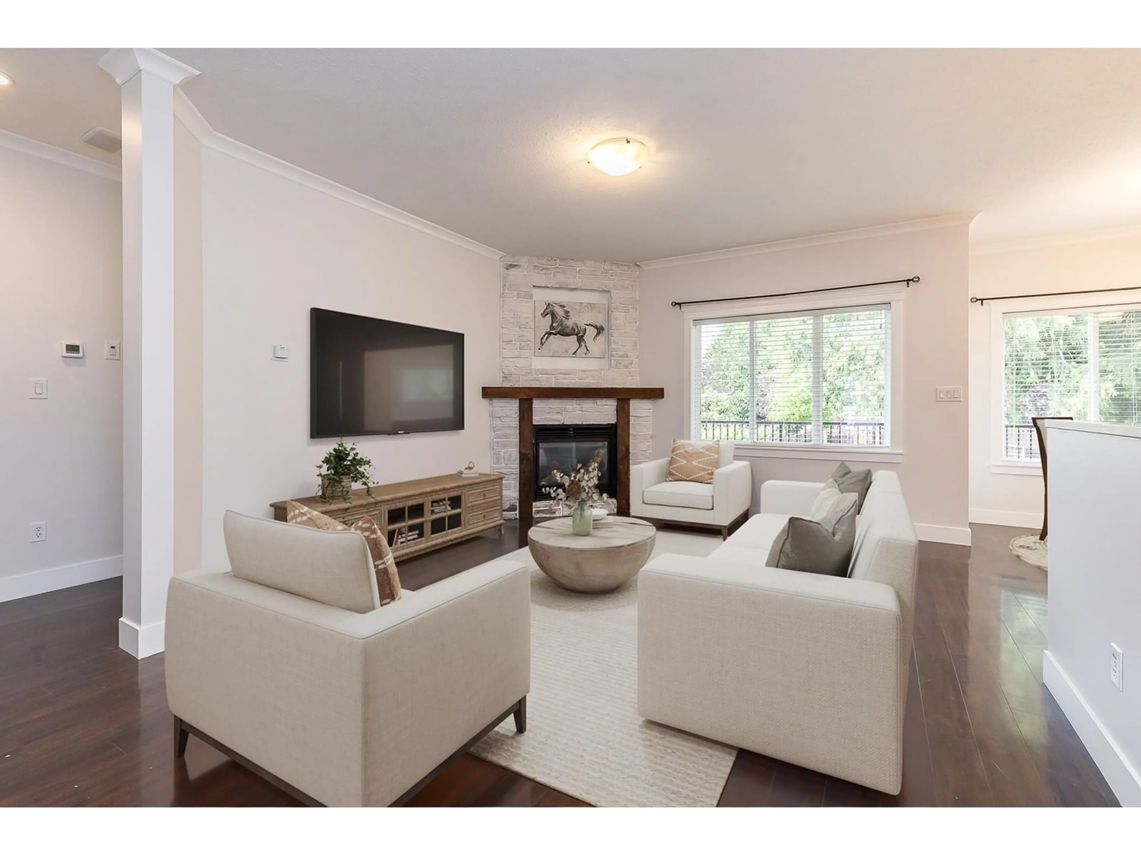 Living room with furniture, wood/laminate floor for 8480 BRADSHAW PLACE, Chilliwack British Columbia V4Z0A7