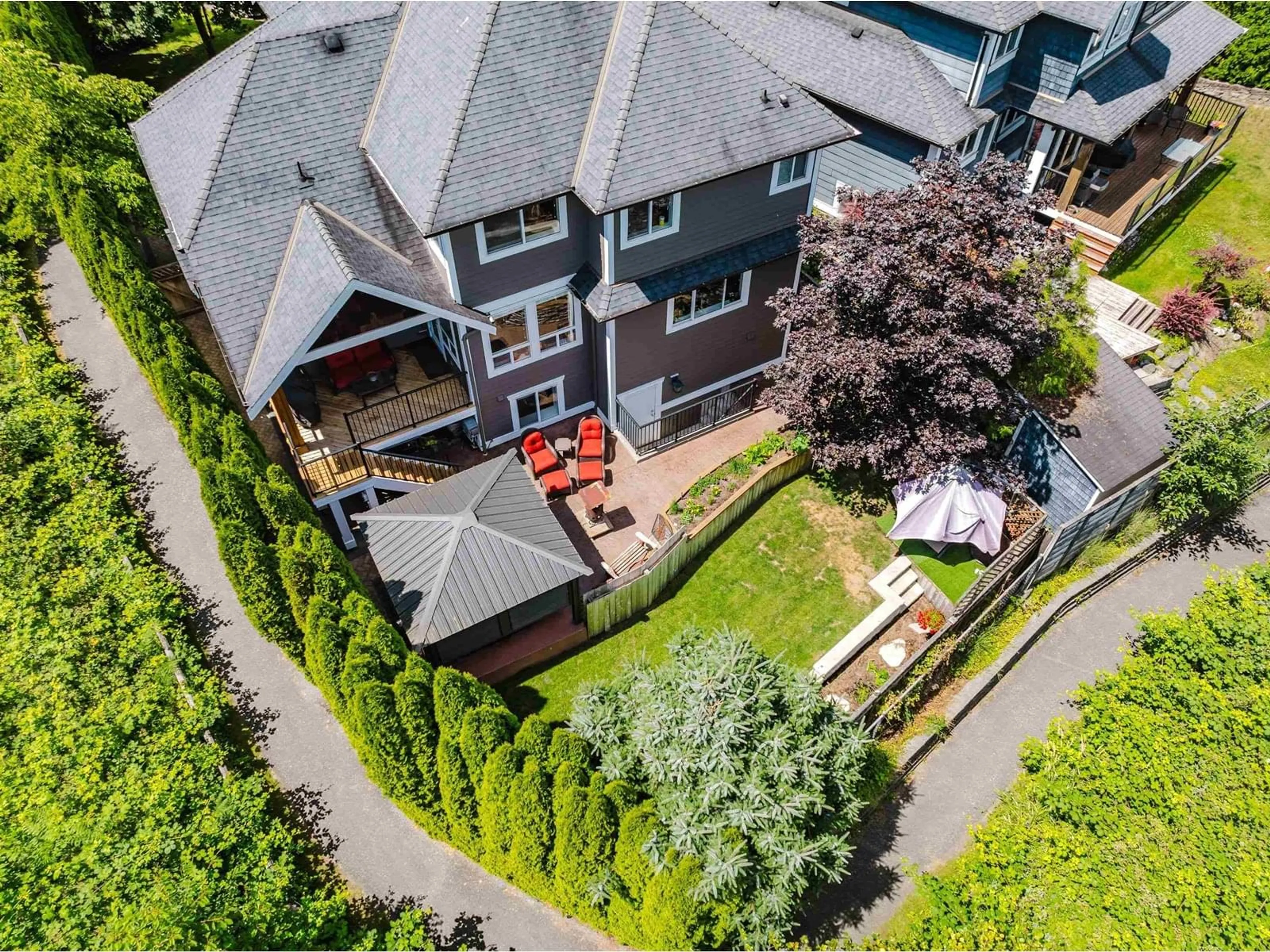 A pic from outside/outdoor area/front of a property/back of a property/a pic from drone, street for 20472 98A, Langley British Columbia V1M0A6