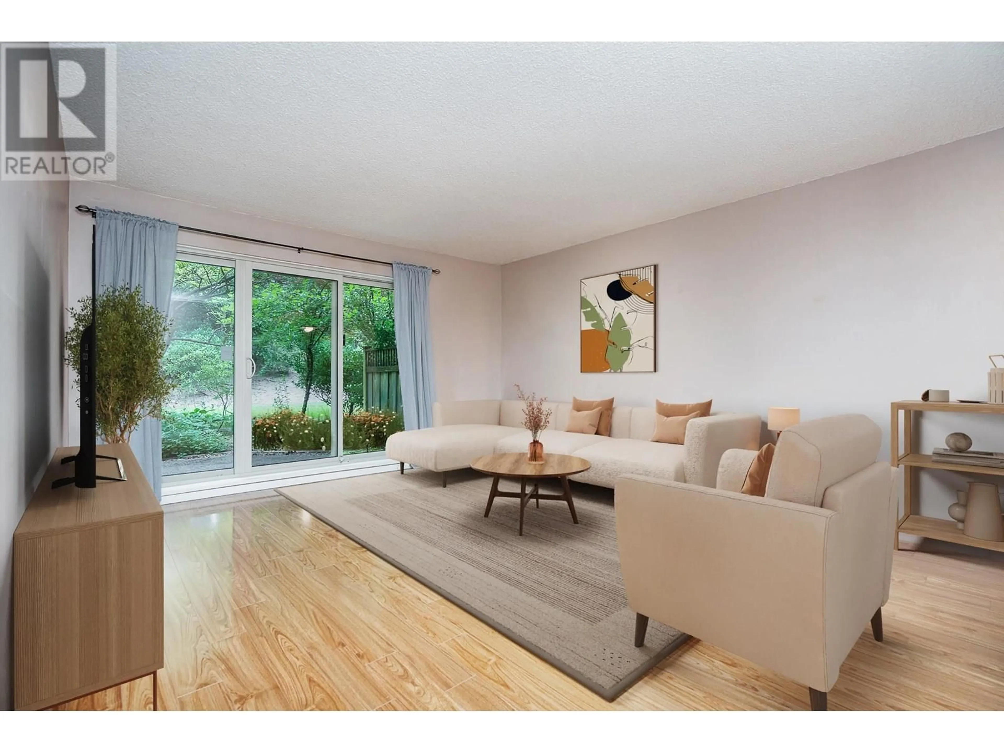 Living room with furniture, wood/laminate floor for 207 - 4373 HALIFAX STREET, Burnaby British Columbia V5C5Z2