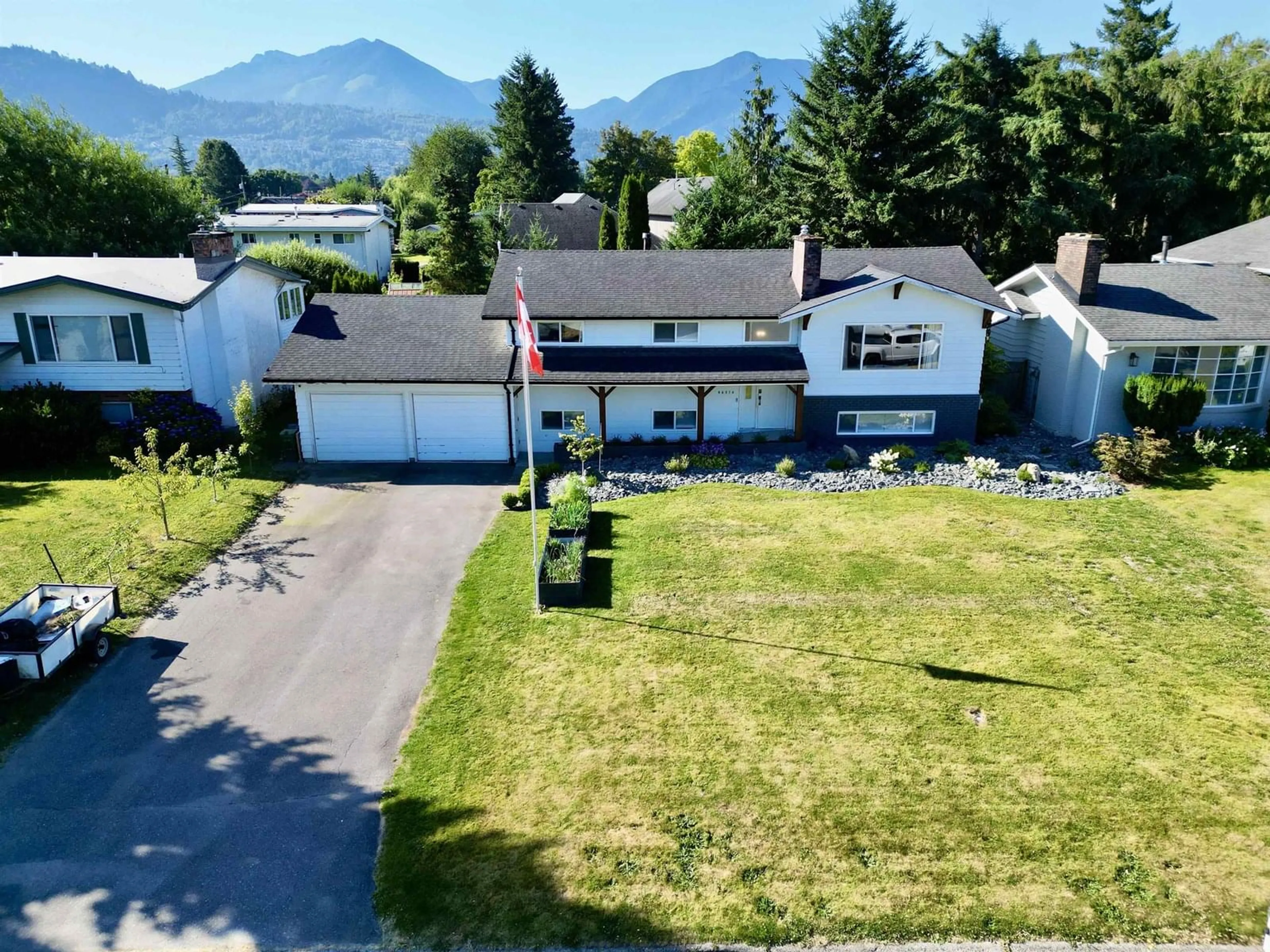 A pic from outside/outdoor area/front of a property/back of a property/a pic from drone, mountain view for 46014 LAKE DRIVE, Chilliwack British Columbia V2R2P9