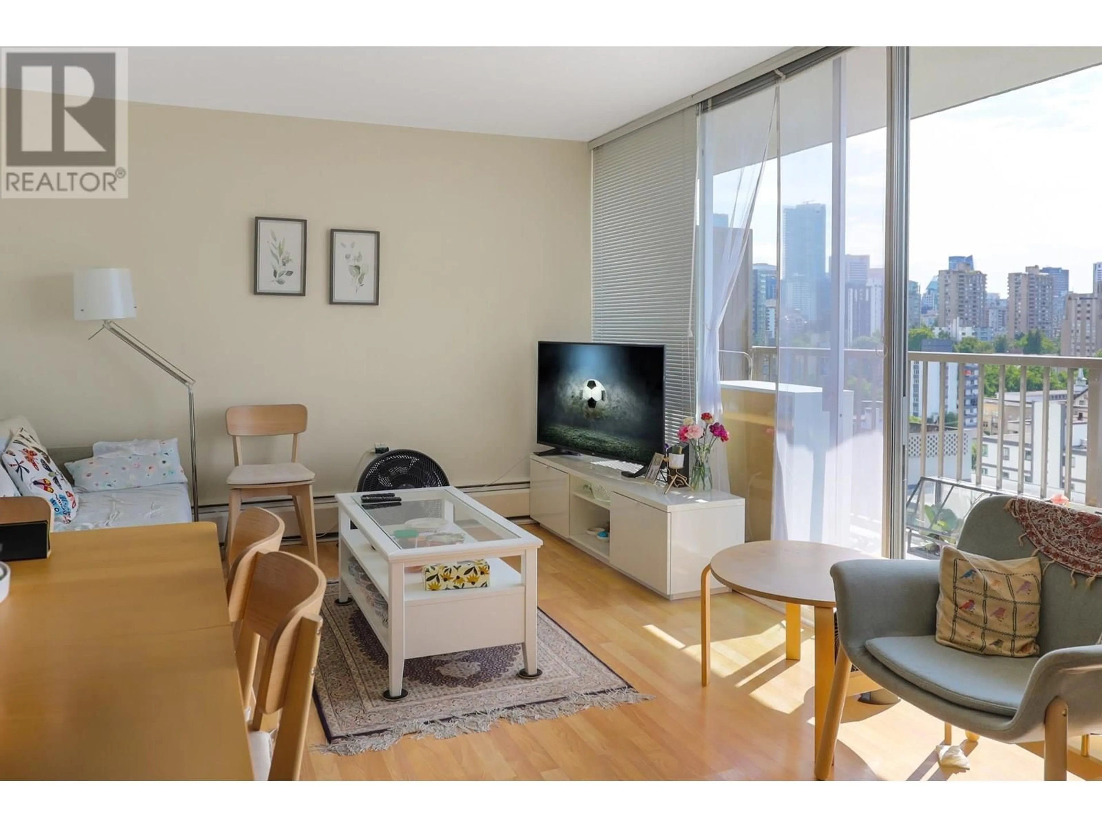 Living room with furniture, wood/laminate floor for 1707 - 1251 CARDERO STREET, Vancouver British Columbia V6G2H9