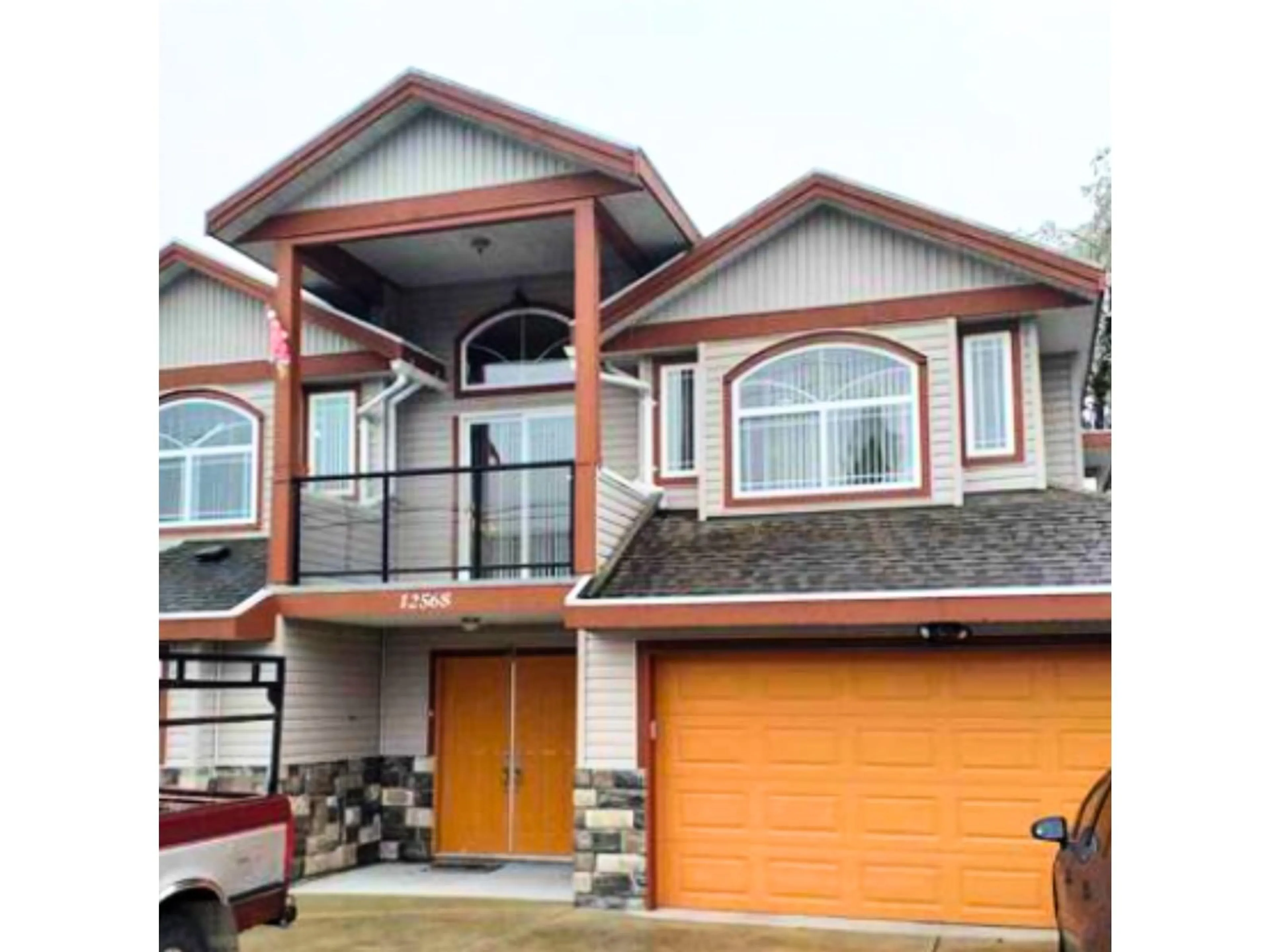Home with vinyl exterior material, street for 12568 96, Surrey British Columbia V3V1X4