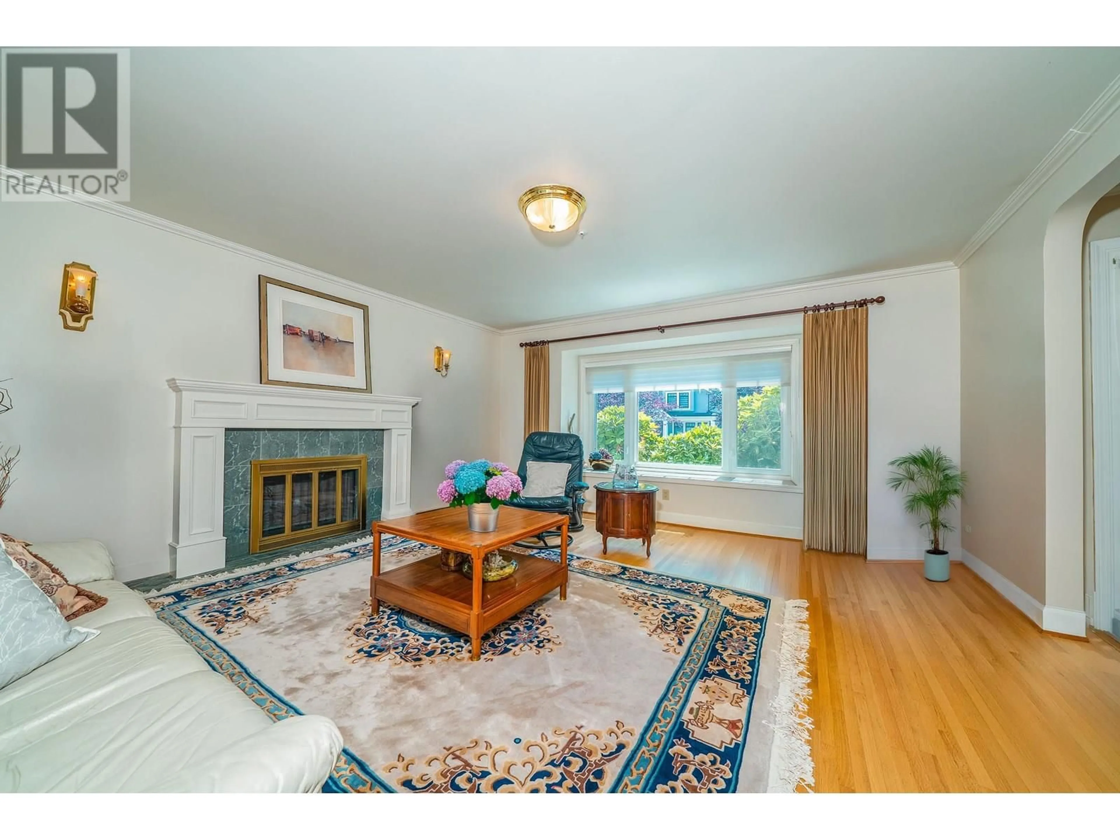 Living room with furniture, wood/laminate floor for 1755 W 58TH AVENUE, Vancouver British Columbia V6P1W8