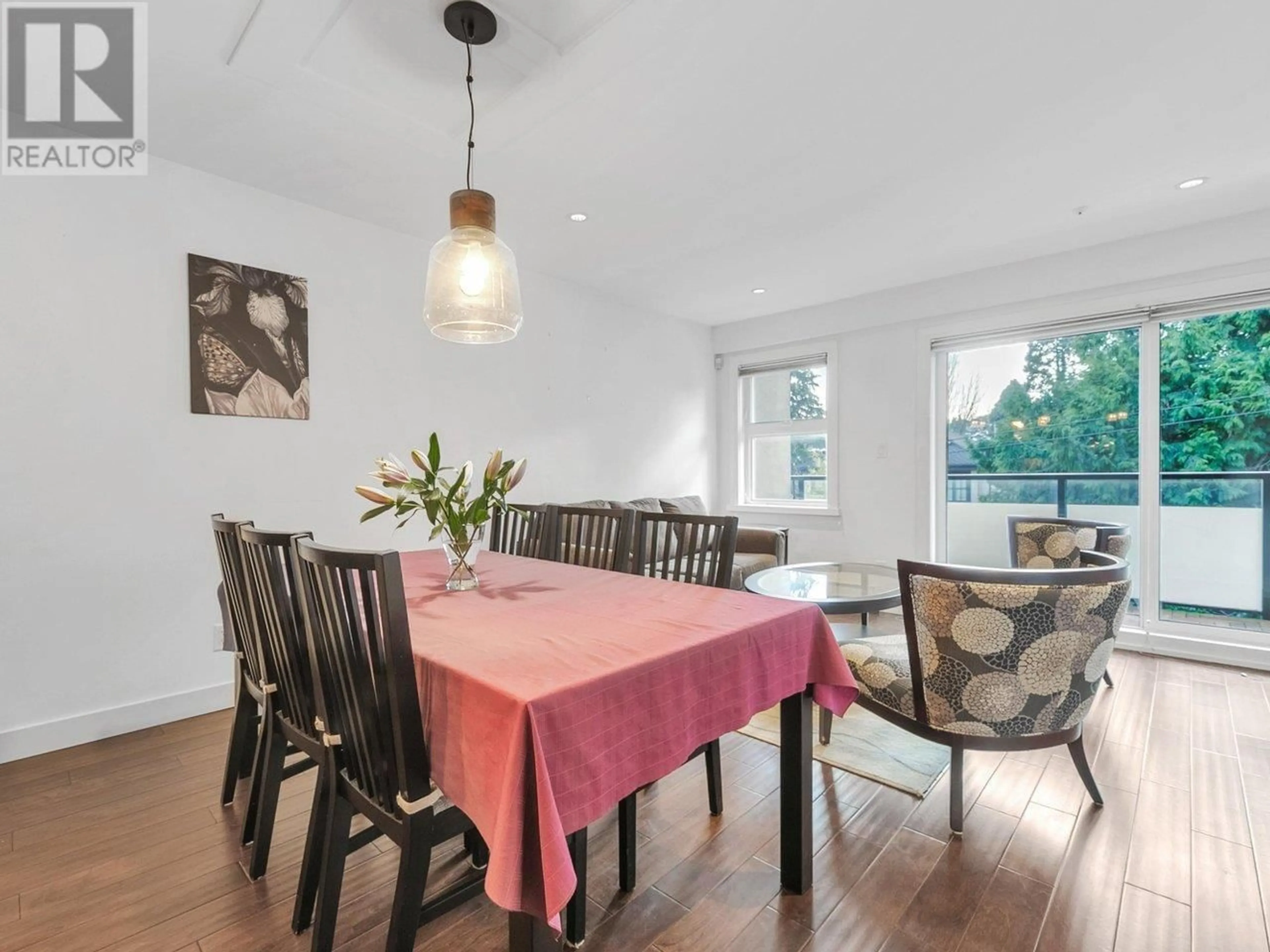 Dining room, wood/laminate floor for 204 - 3788 10TH AVENUE, Vancouver British Columbia V6R2G4