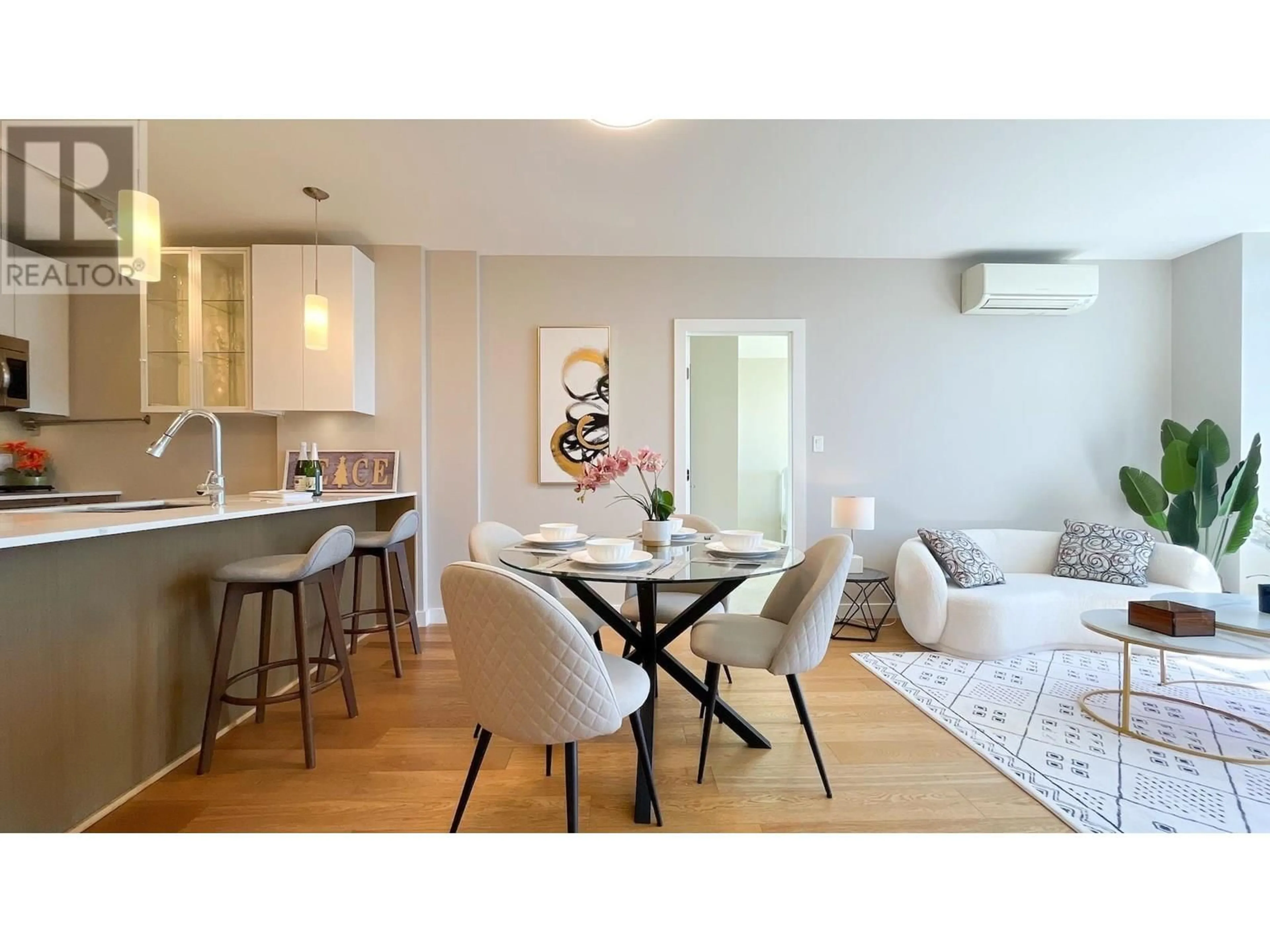 Open concept kitchen, wood/laminate floor for 1009 - 6971 ELMBRIDGE WAY, Richmond British Columbia V7C0A5