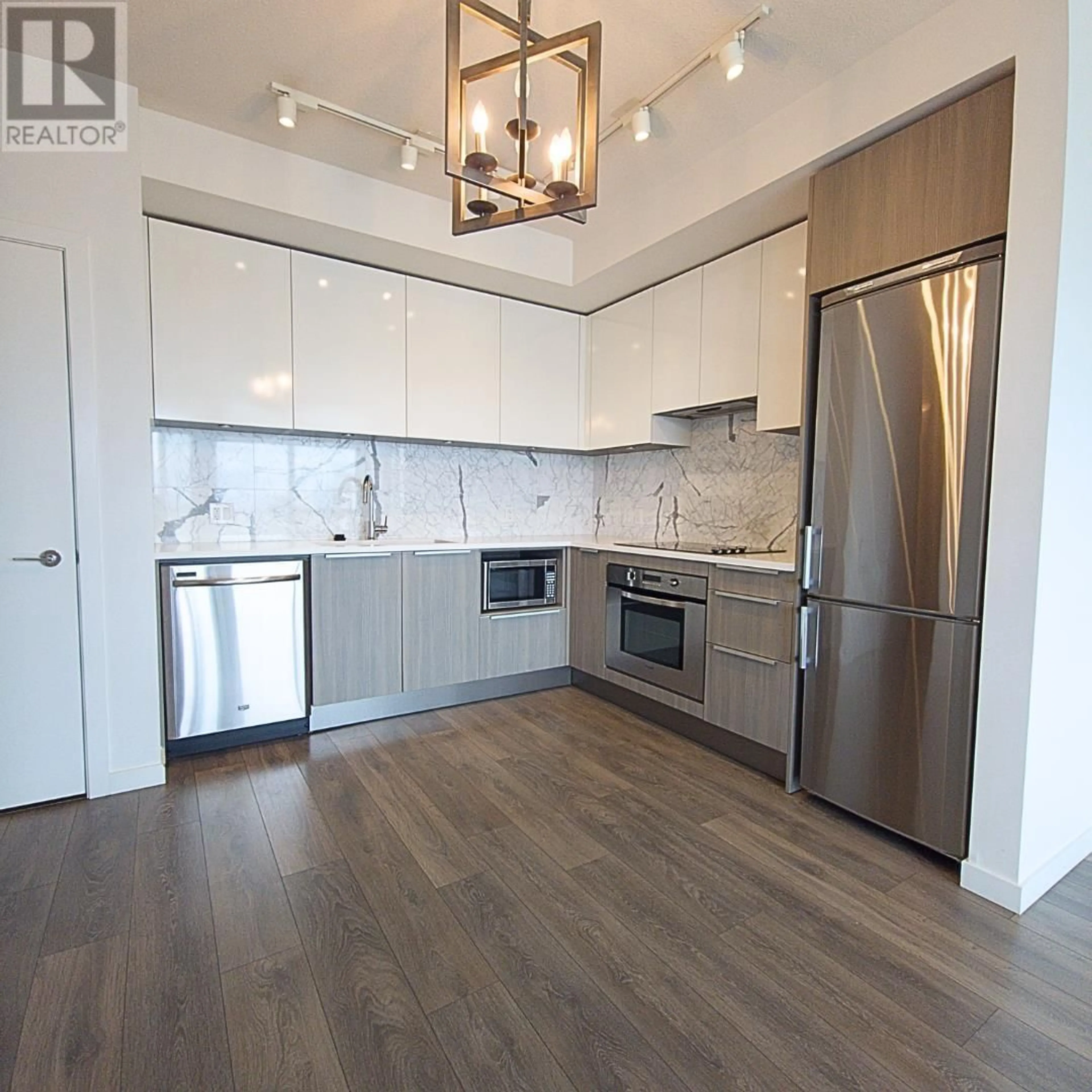 Open concept kitchen, wood/laminate floor for 5101 - 6461 TELFORD AVENUE, Burnaby British Columbia V5H0B7