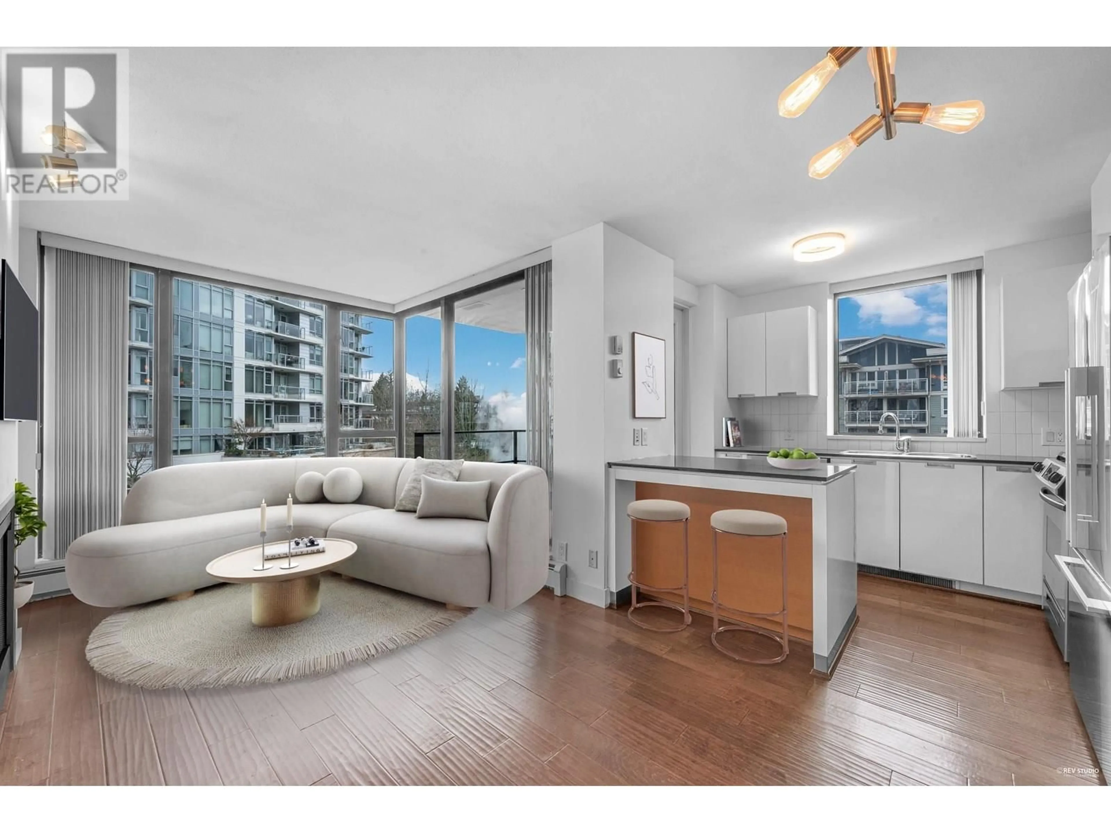 Open concept kitchen, wood/laminate floor for 605 - 151 2ND STREET, North Vancouver British Columbia V7M3P1