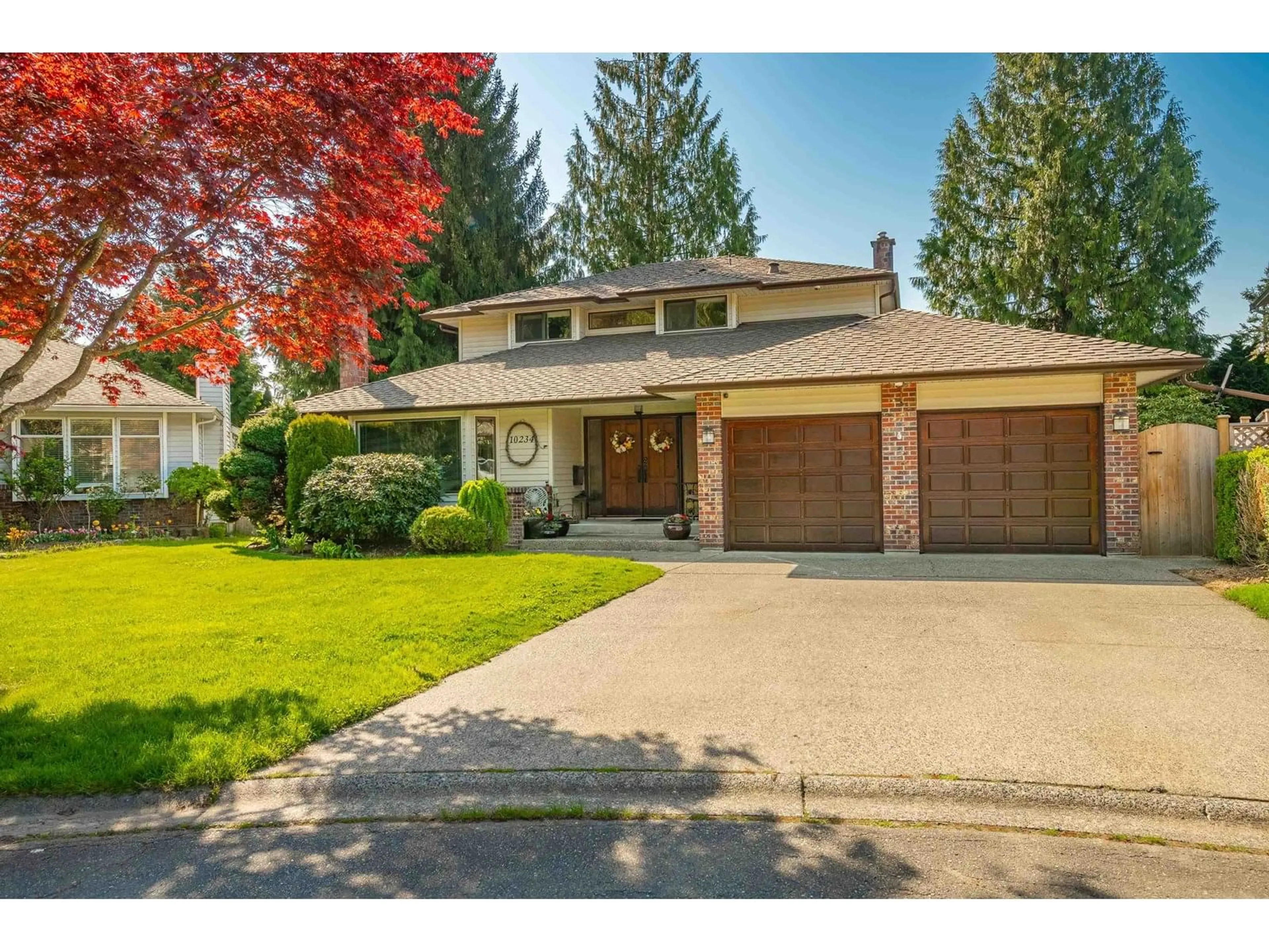 Home with vinyl exterior material, street for 10234 156A, Surrey British Columbia V4N2H2