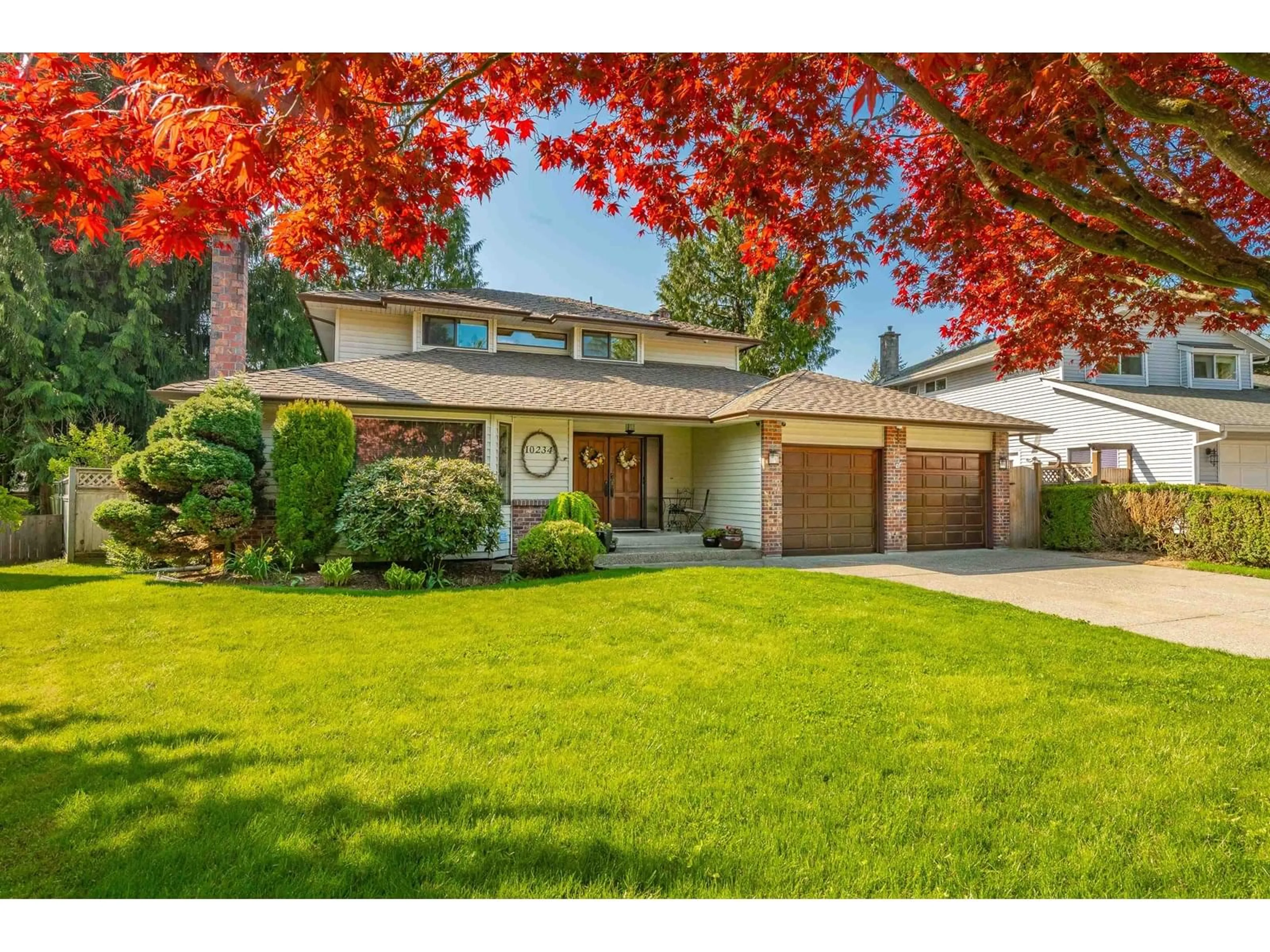 Home with vinyl exterior material, street for 10234 156A, Surrey British Columbia V4N2H2