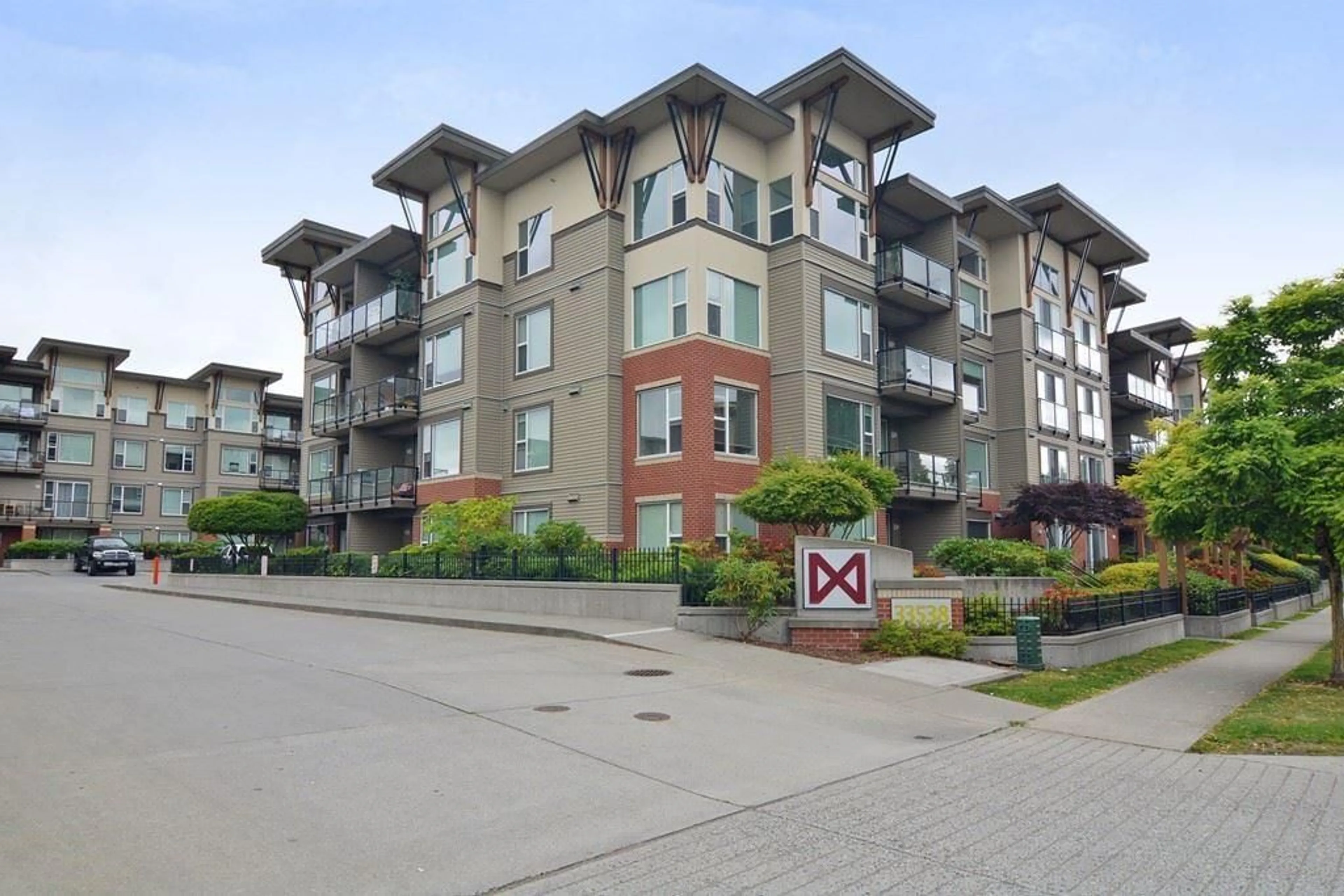 A pic from outside/outdoor area/front of a property/back of a property/a pic from drone, unknown for 101 - 33538 MARSHALL, Abbotsford British Columbia V2S0C7
