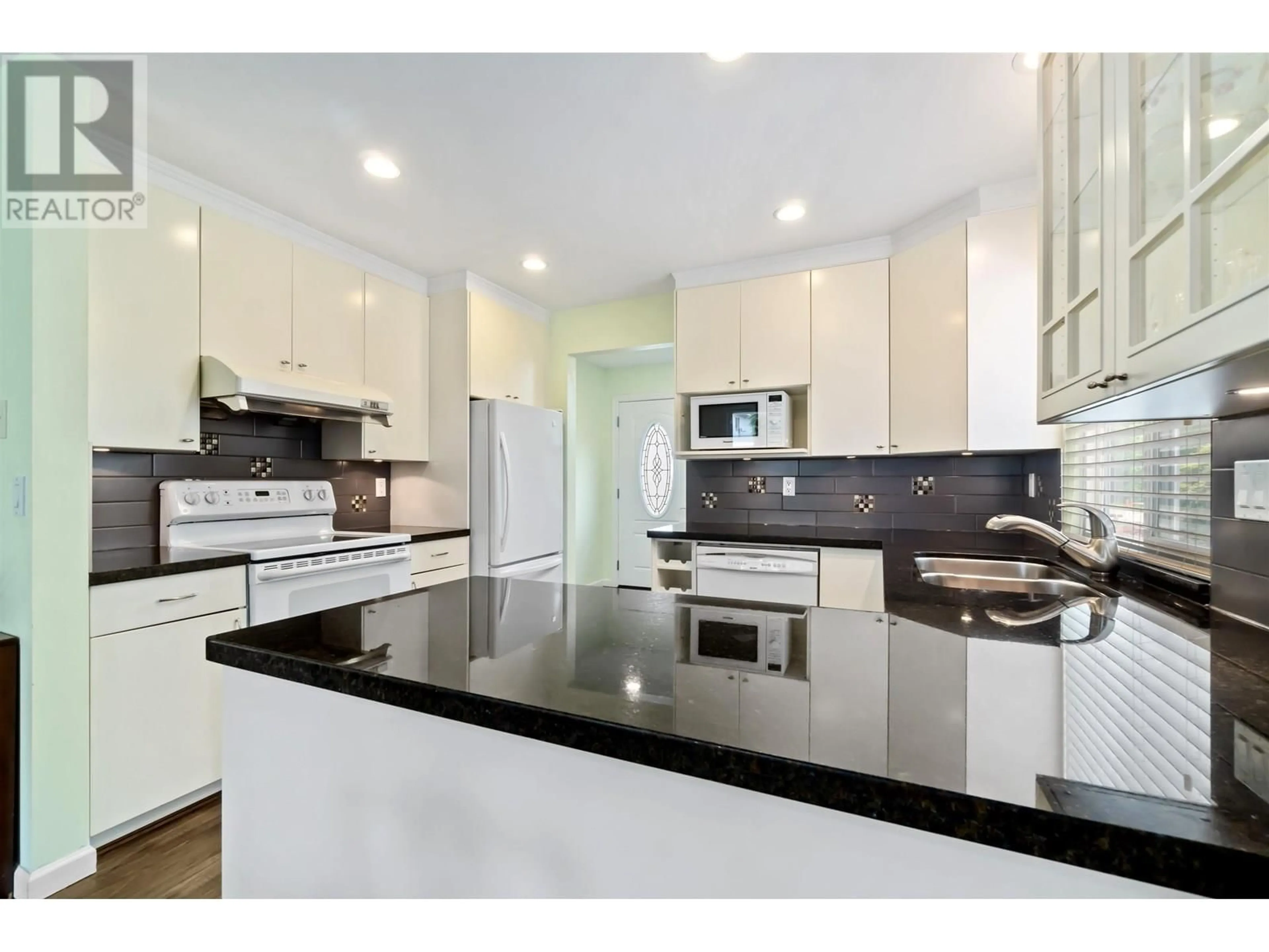 Open concept kitchen, ceramic/tile floor for 1781 SUFFOLK AVENUE, Port Coquitlam British Columbia V3B5G6