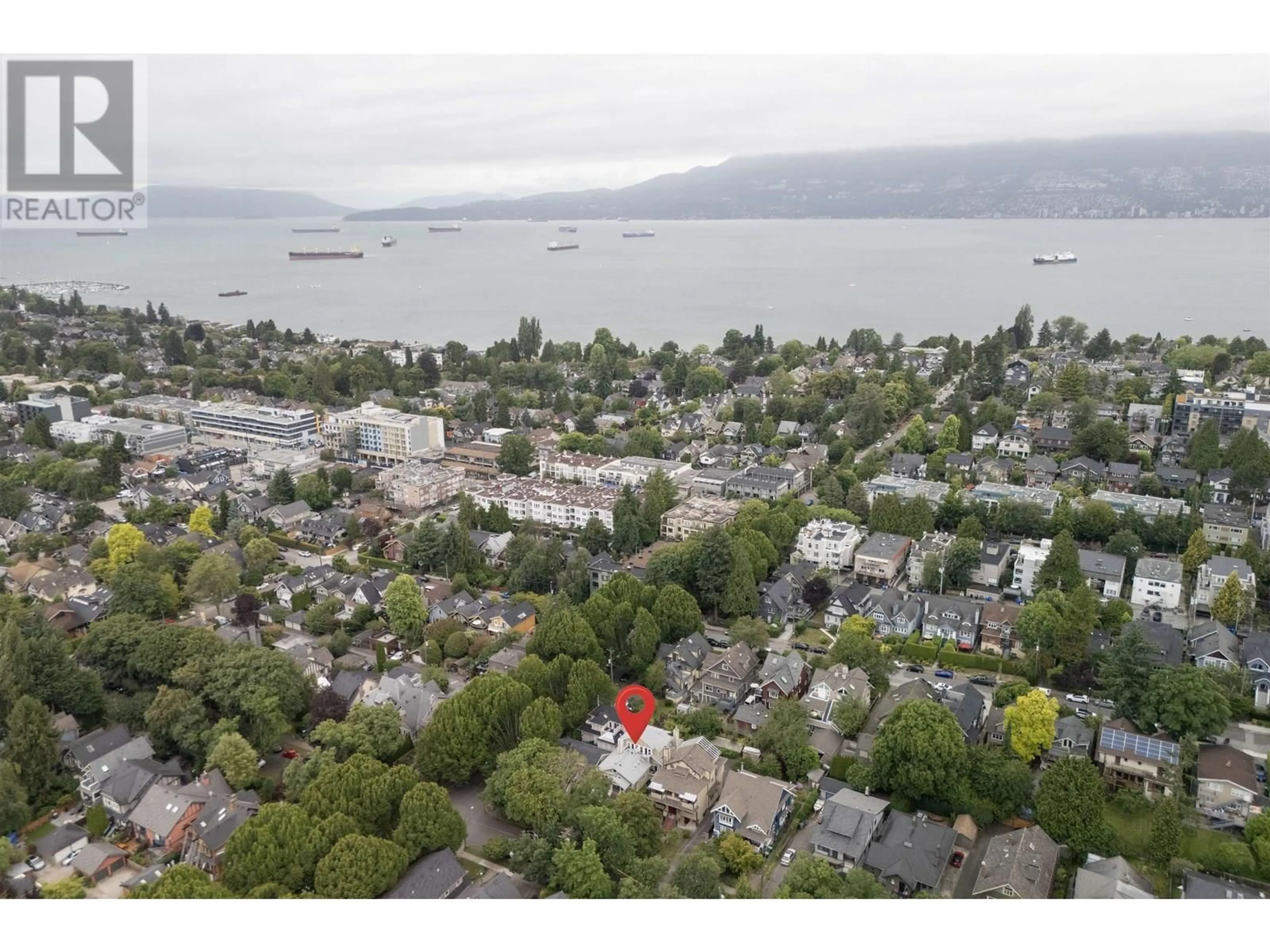 A pic from outside/outdoor area/front of a property/back of a property/a pic from drone, water/lake/river/ocean view for 2587 6TH AVENUE, Vancouver British Columbia V6K1W4