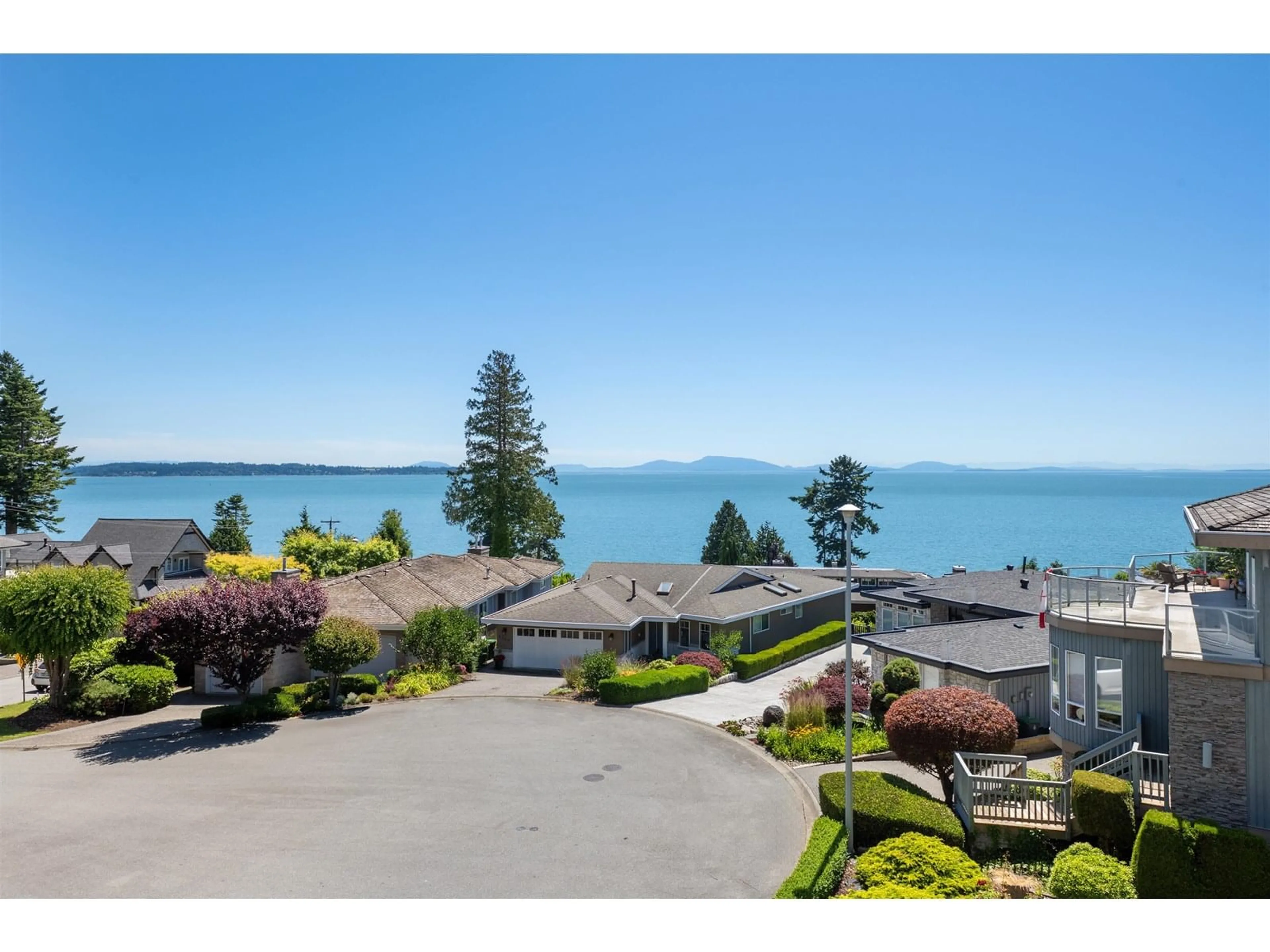 A pic from outside/outdoor area/front of a property/back of a property/a pic from drone, water/lake/river/ocean view for 1343 132B, Surrey British Columbia V4A4C2