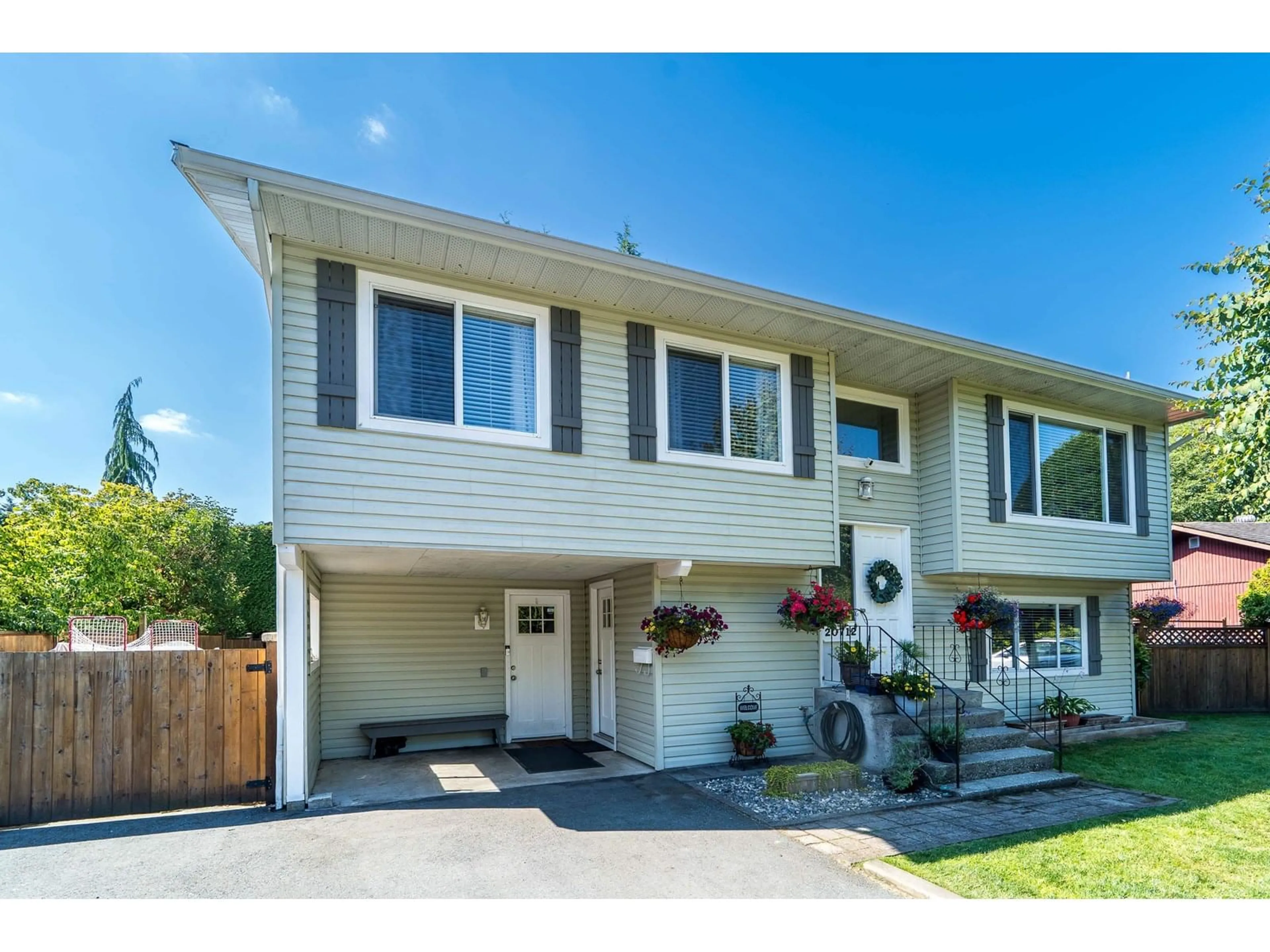 Home with vinyl exterior material, street for 20712 52, Langley British Columbia V3A6C7