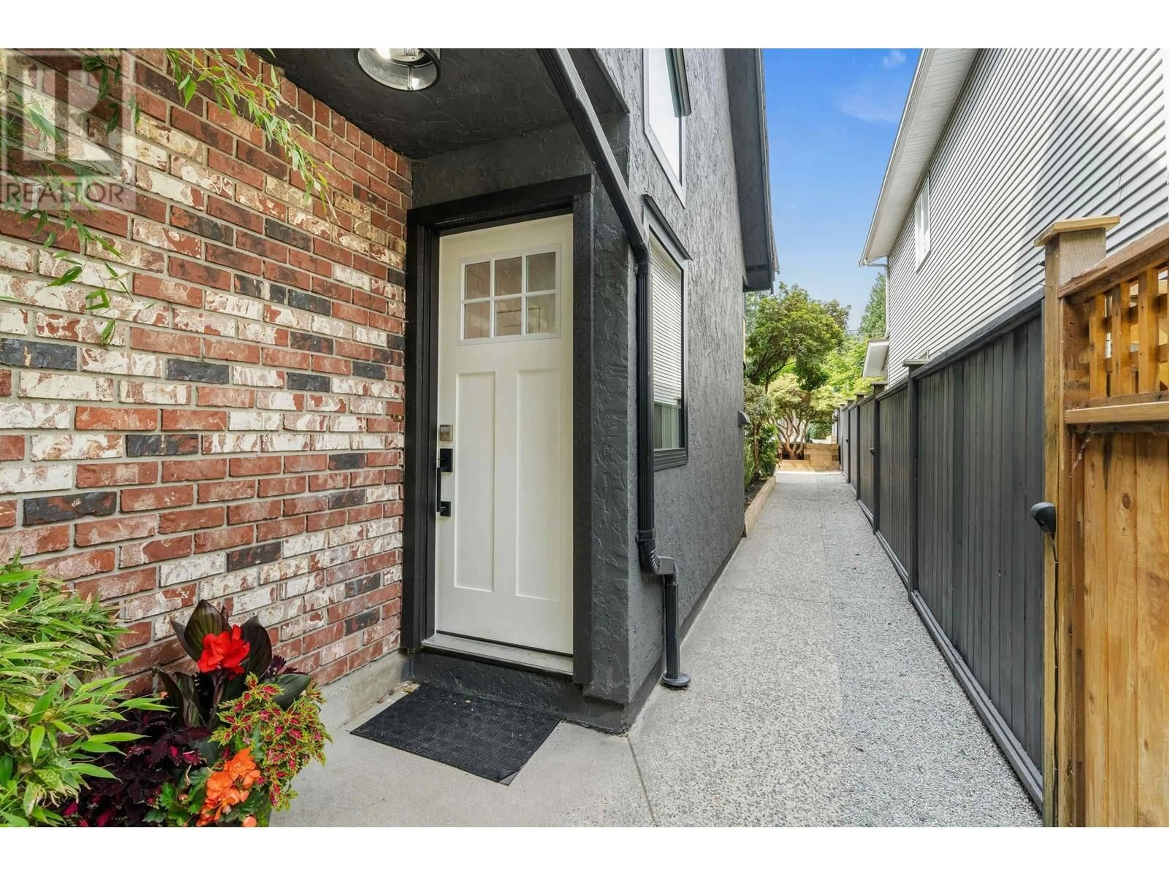 Home with brick exterior material, street for 1430 DRAYCOTT ROAD, North Vancouver British Columbia V7J1W2