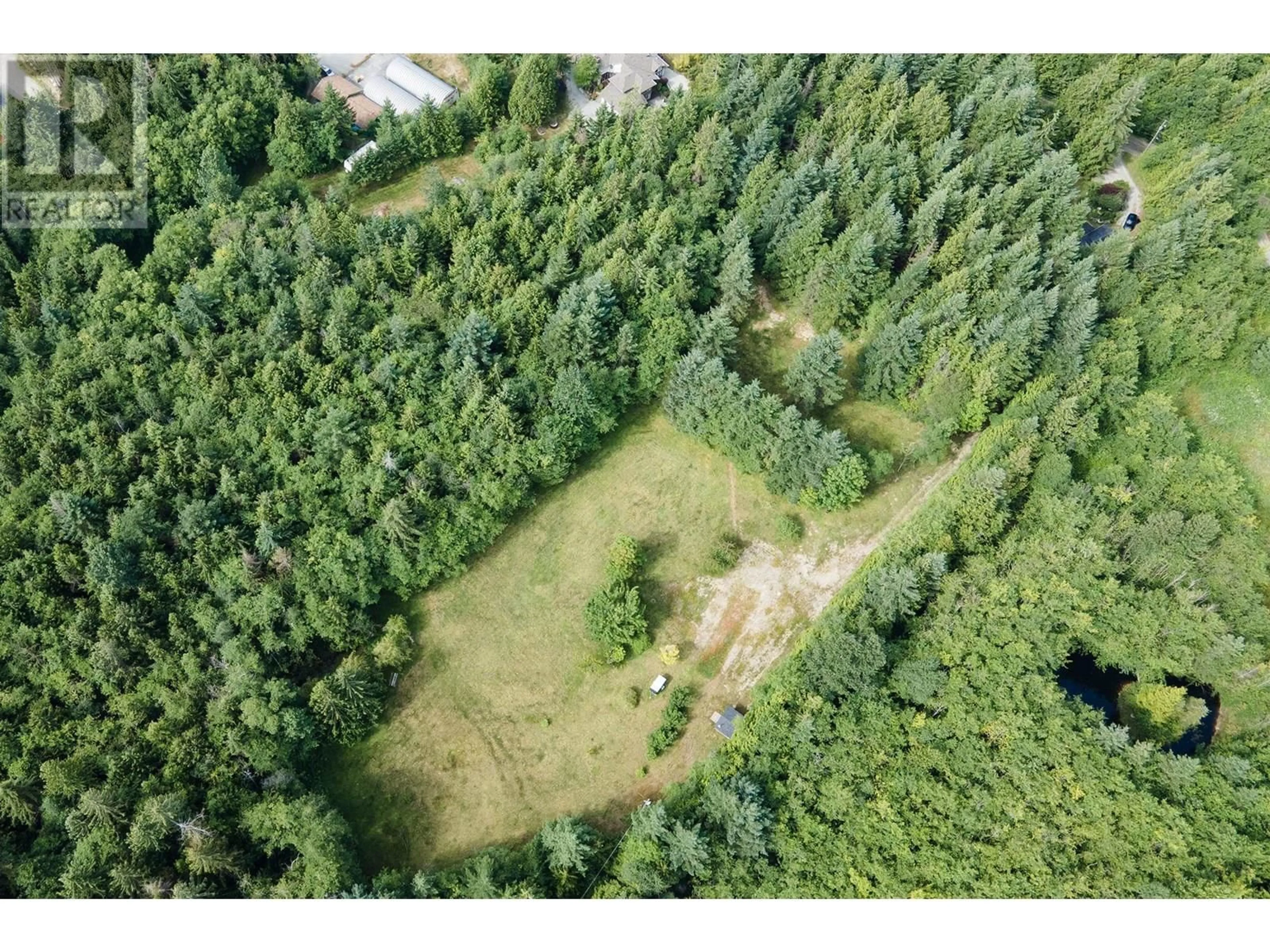 A pic from outside/outdoor area/front of a property/back of a property/a pic from drone, forest/trees view for 1632 PELL ROAD, Roberts Creek British Columbia V0N2W1