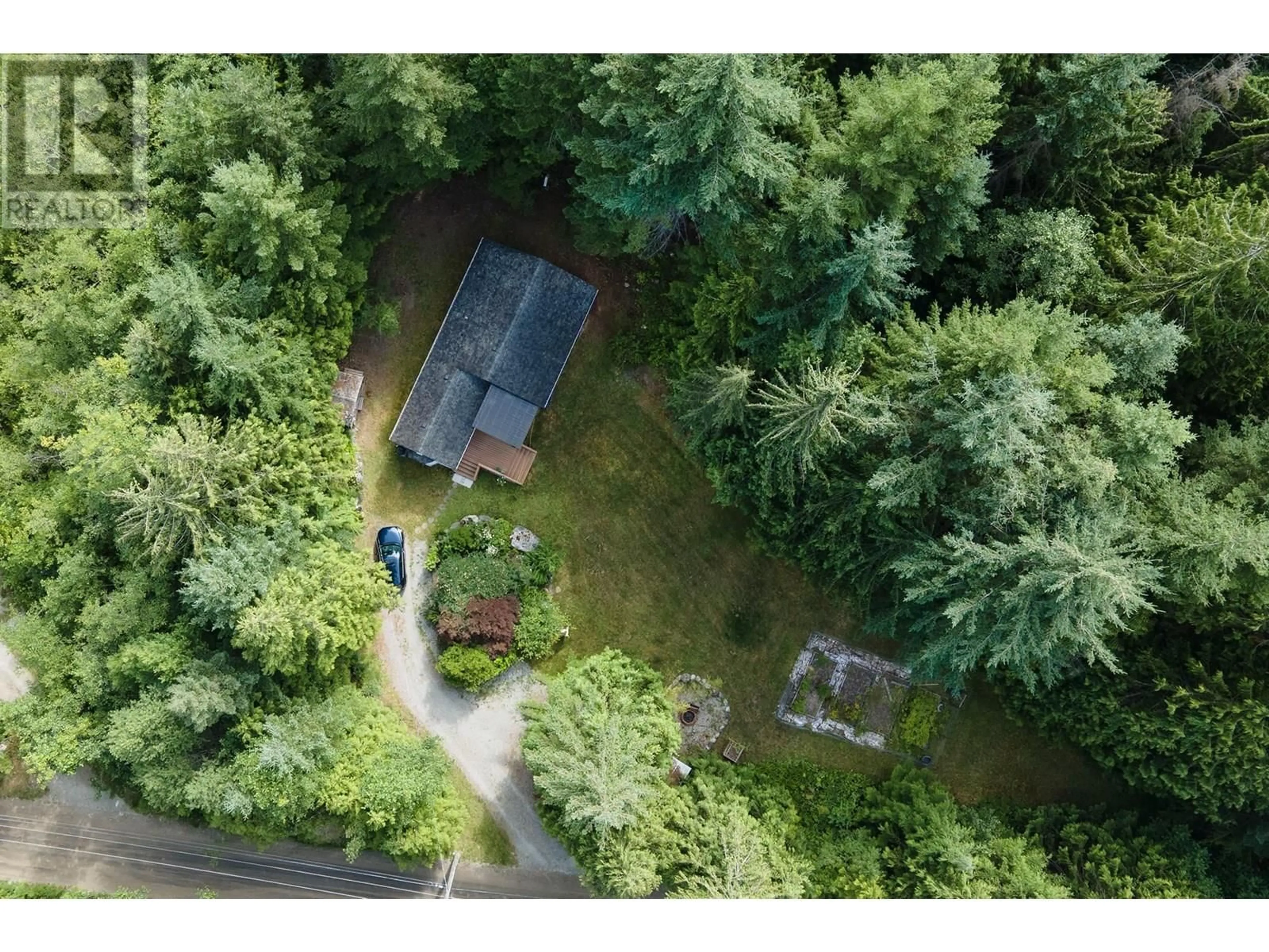 A pic from outside/outdoor area/front of a property/back of a property/a pic from drone, forest/trees view for 1632 PELL ROAD, Roberts Creek British Columbia V0N2W1