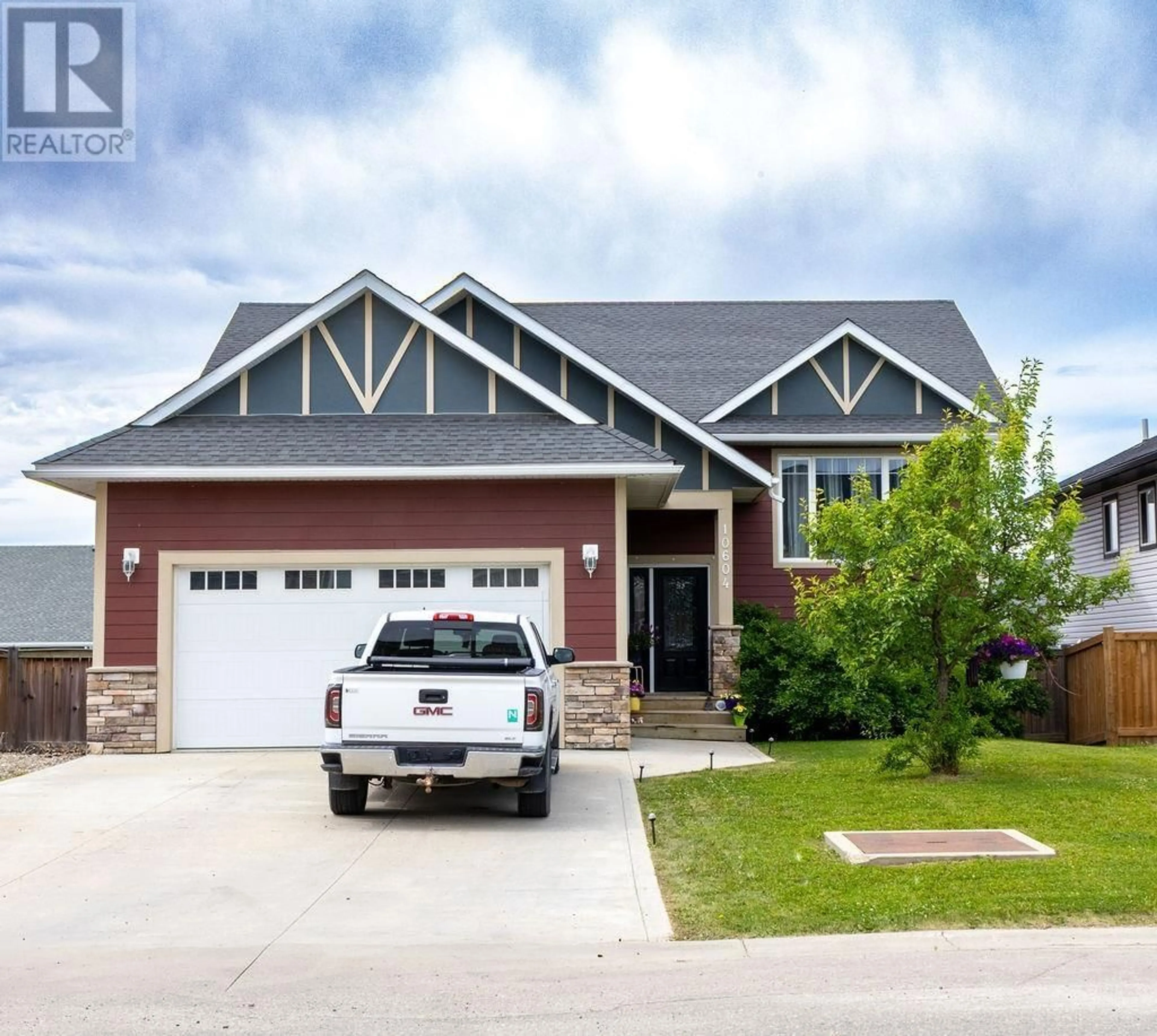Home with vinyl exterior material, street for 10604 109 STREET, Fort St. John British Columbia V1J0J3