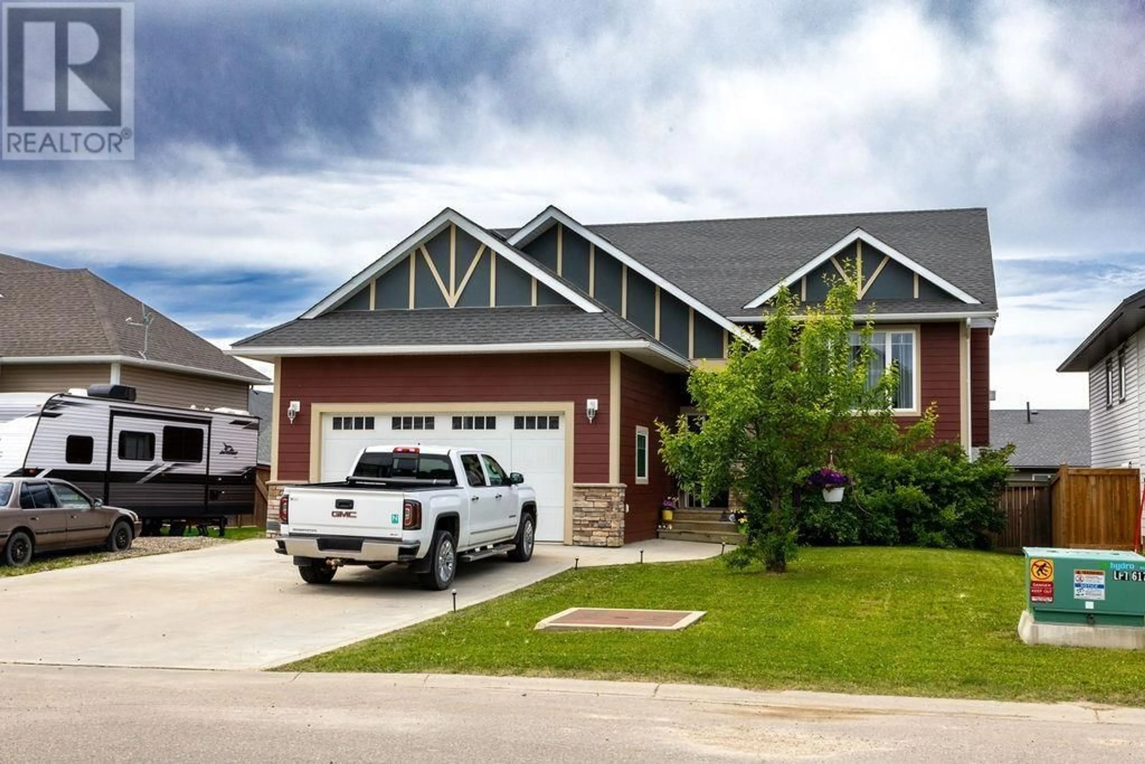 Home with vinyl exterior material, street for 10604 109 STREET, Fort St. John British Columbia V1J0J3