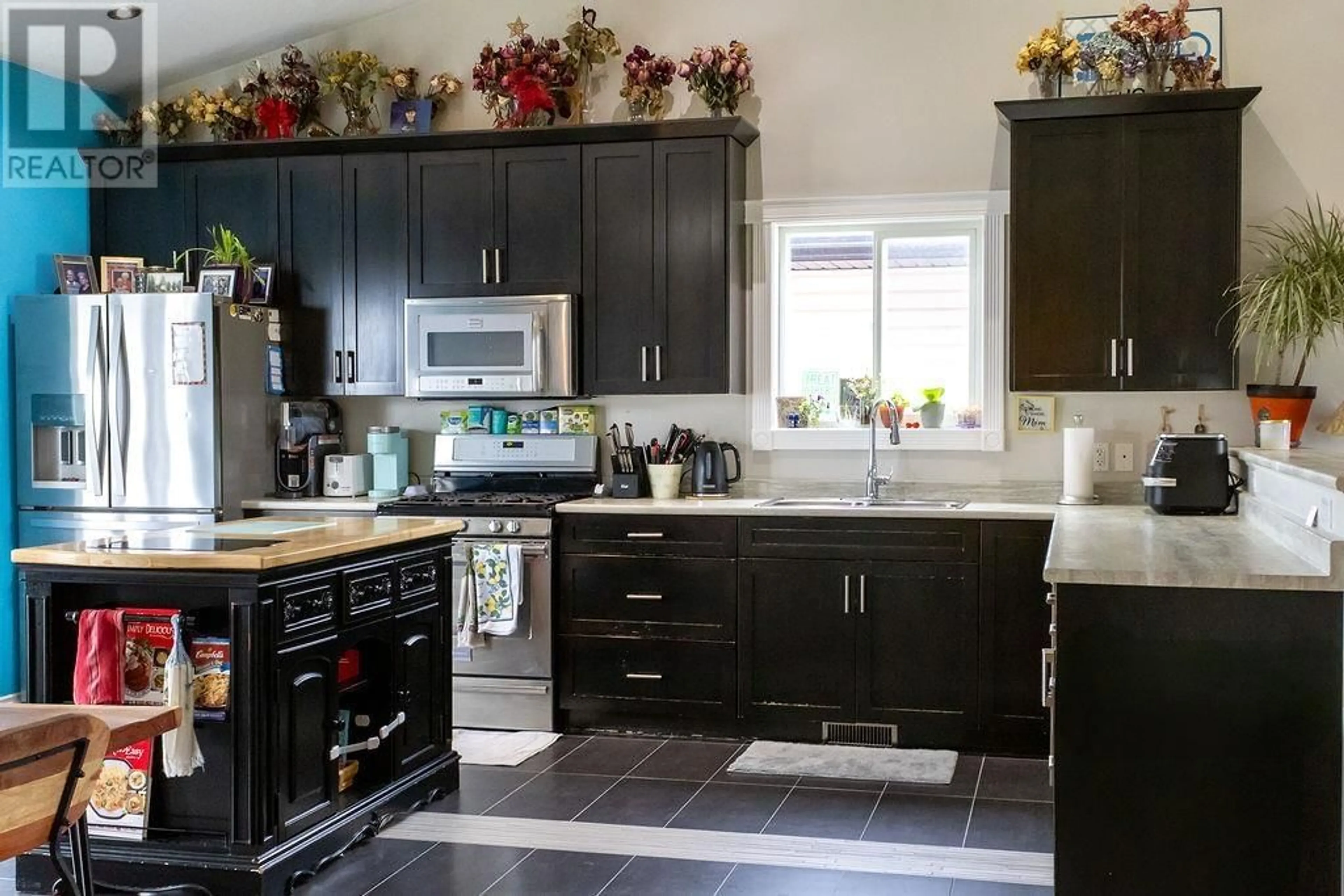 Contemporary kitchen, ceramic/tile floor for 10604 109 STREET, Fort St. John British Columbia V1J0J3