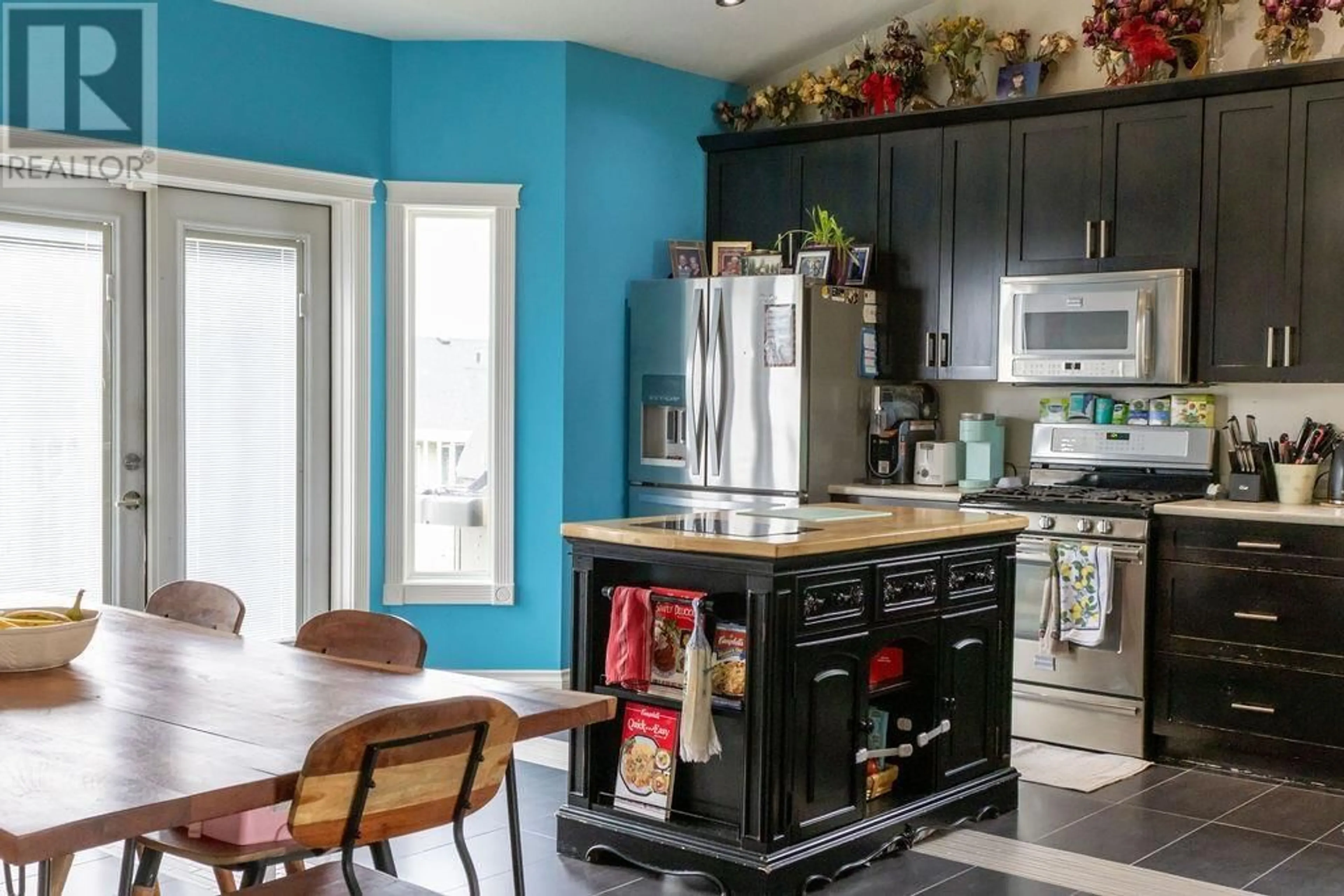 Open concept kitchen, ceramic/tile floor for 10604 109 STREET, Fort St. John British Columbia V1J0J3