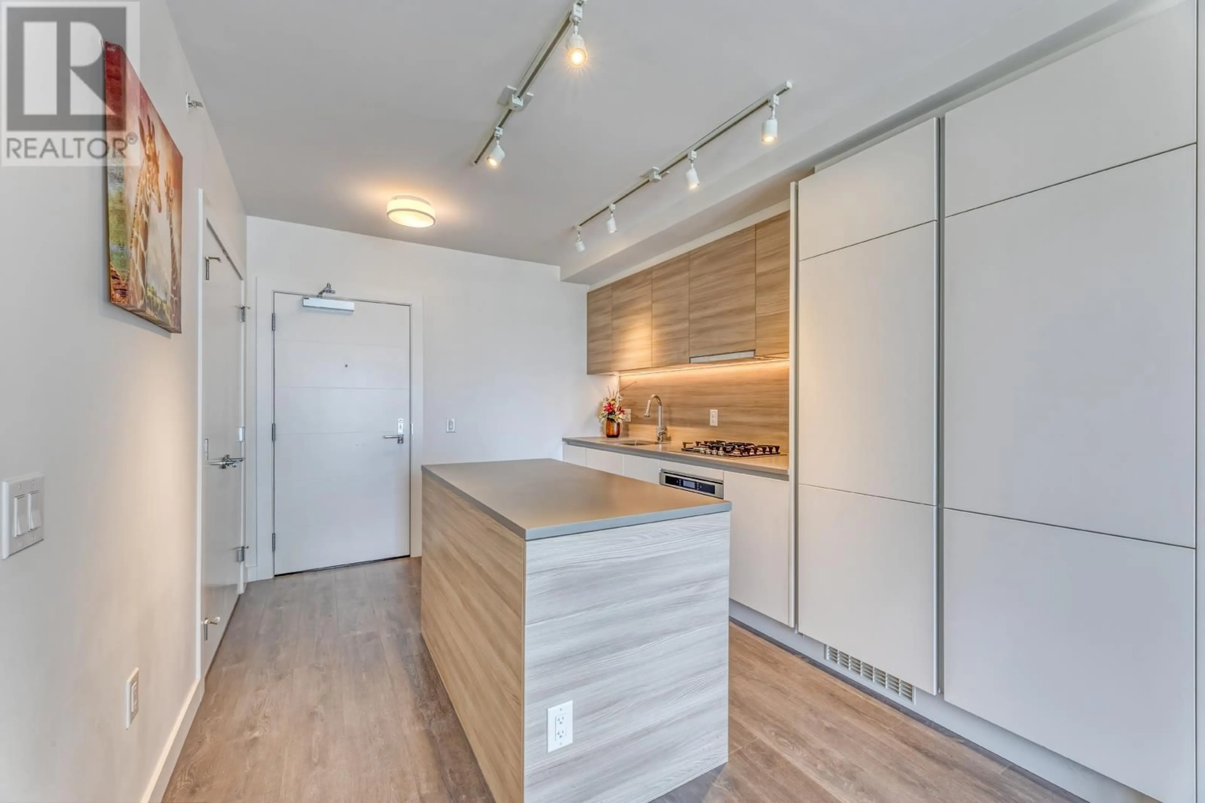 Open concept kitchen, wood/laminate floor for 508 - 657 WHITING WAY, Coquitlam British Columbia V3J0J6